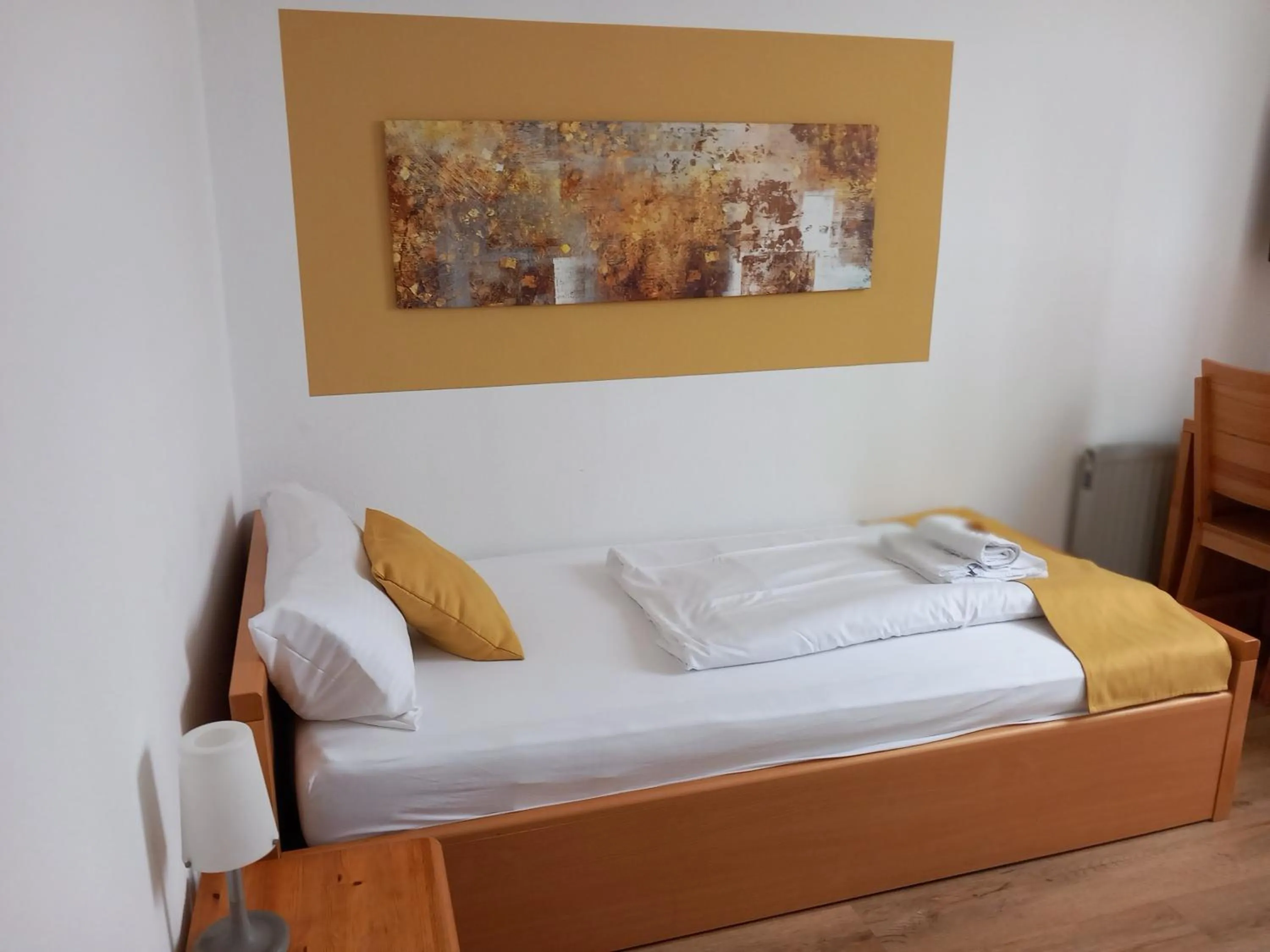 Bed in Hotel Karolinger - Self Check-In