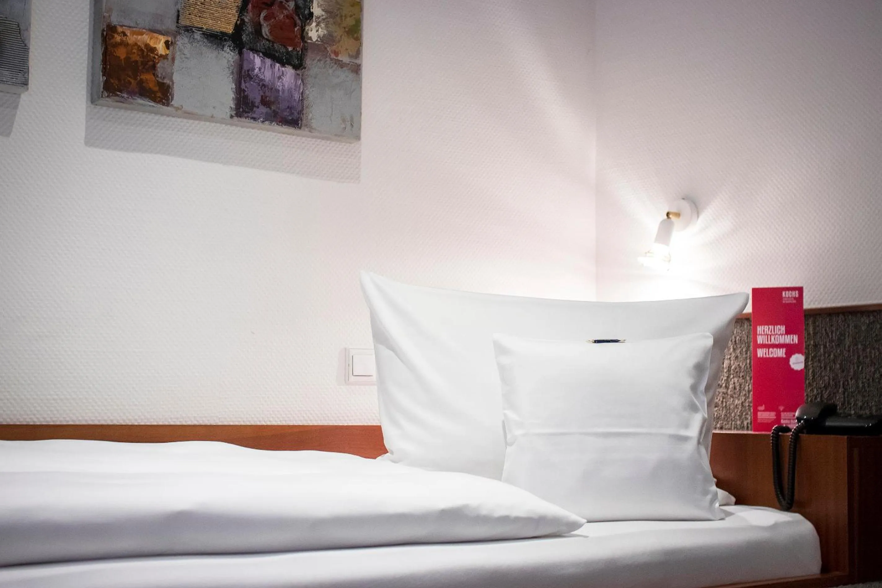 Bed in Kochs Stadthotel