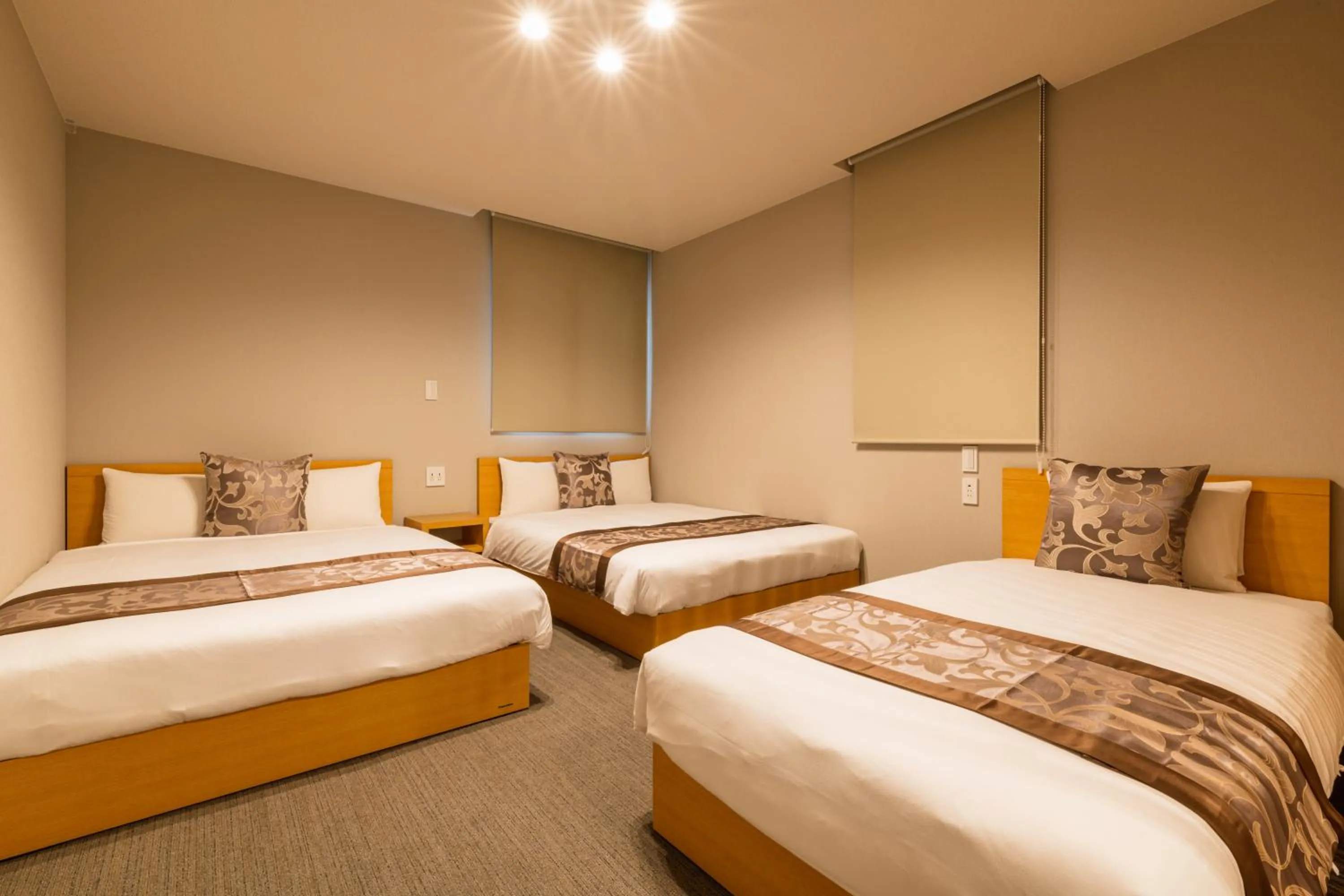 Bed in GRAND BASE Nagasaki Chukagai