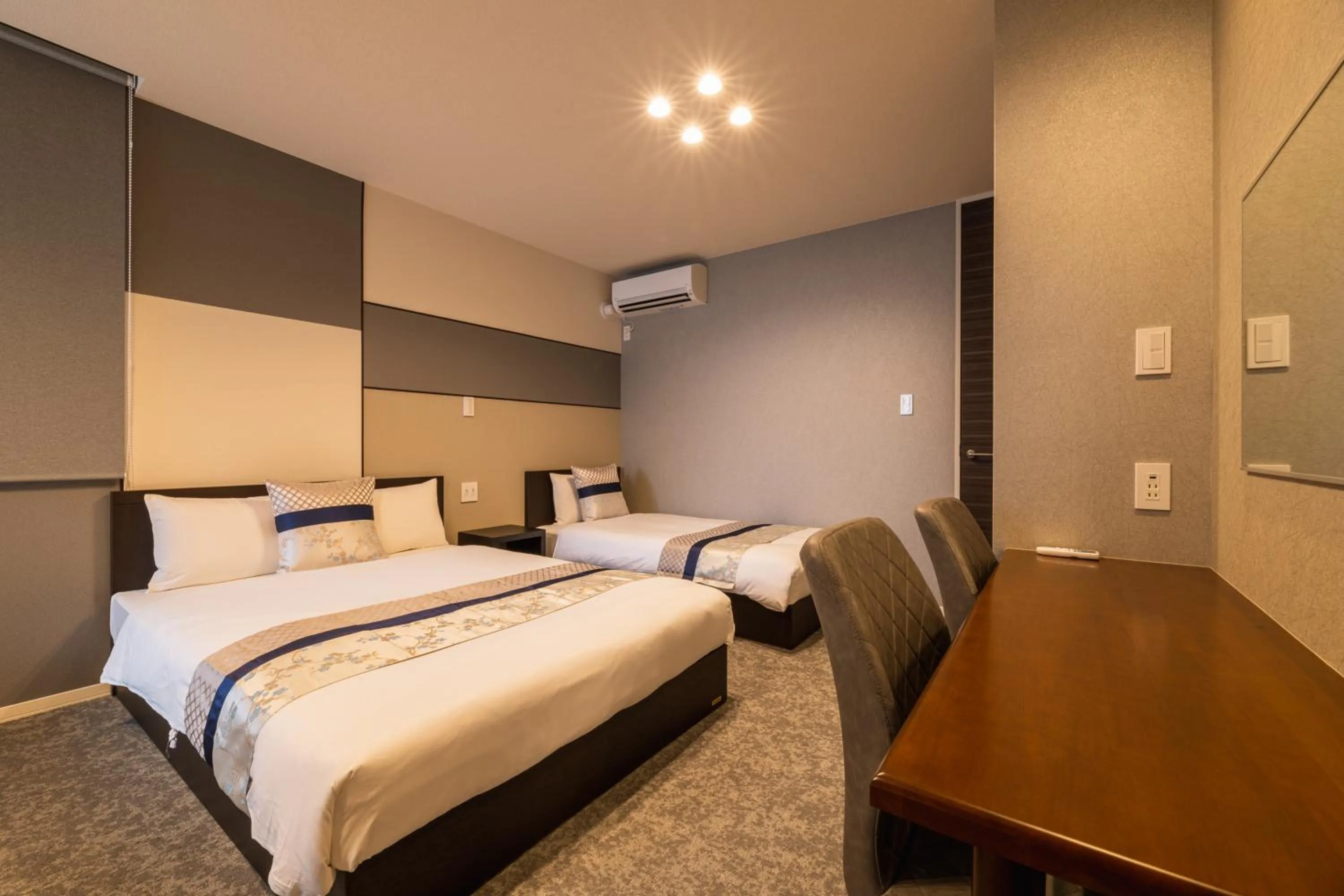 Bed in GRAND BASE Nagasaki Chukagai