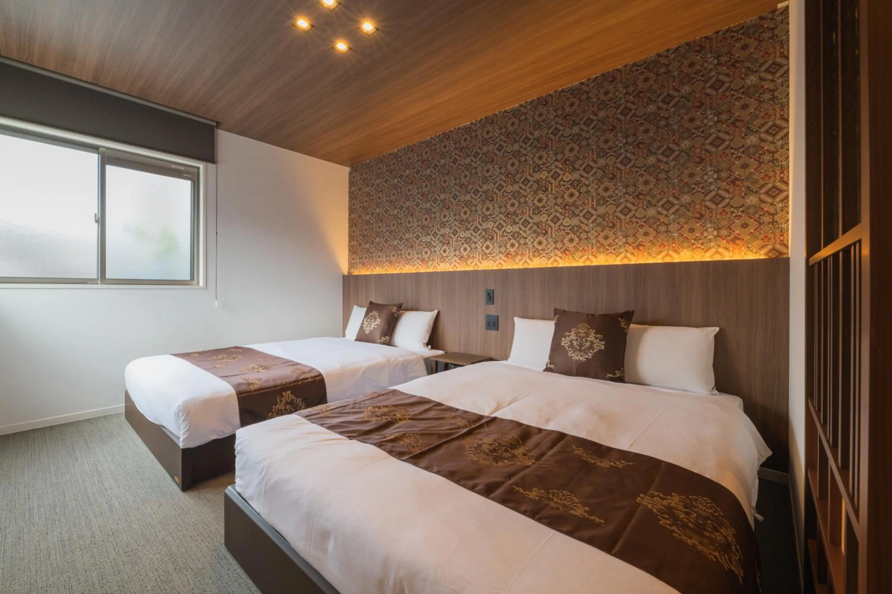 Bed in GRAND BASE Nagasaki Chukagai