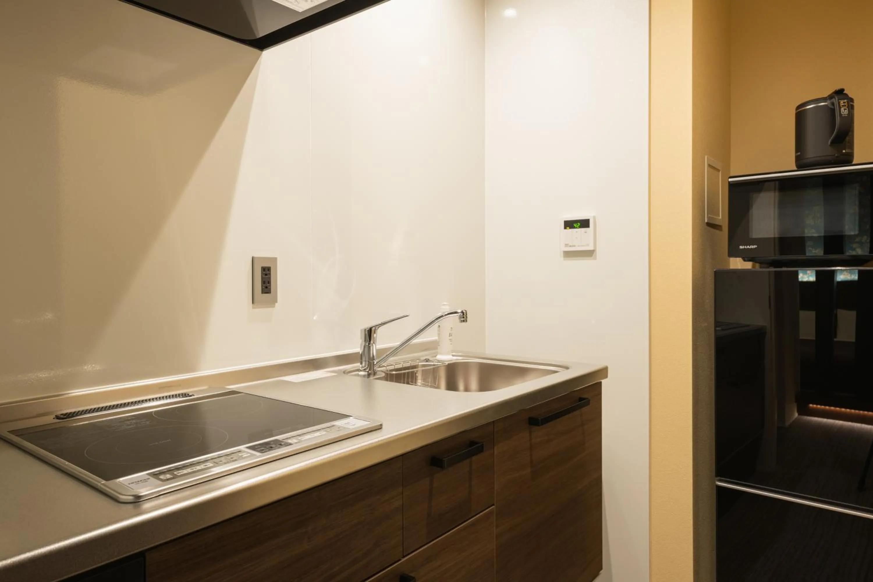 Kitchen or kitchenette in HOTEL All Stay Hakata Kukodori