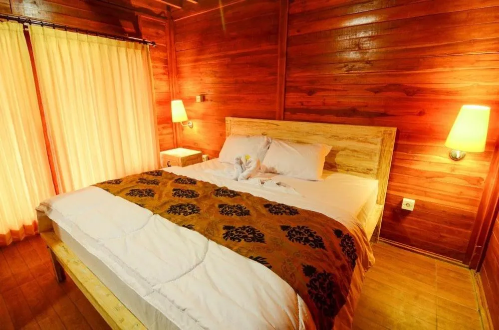 Bed in Villa Kedisan Lakeview