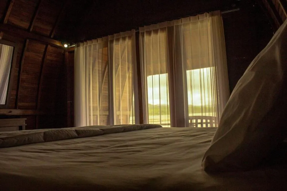 Bed in Villa Kedisan Lakeview