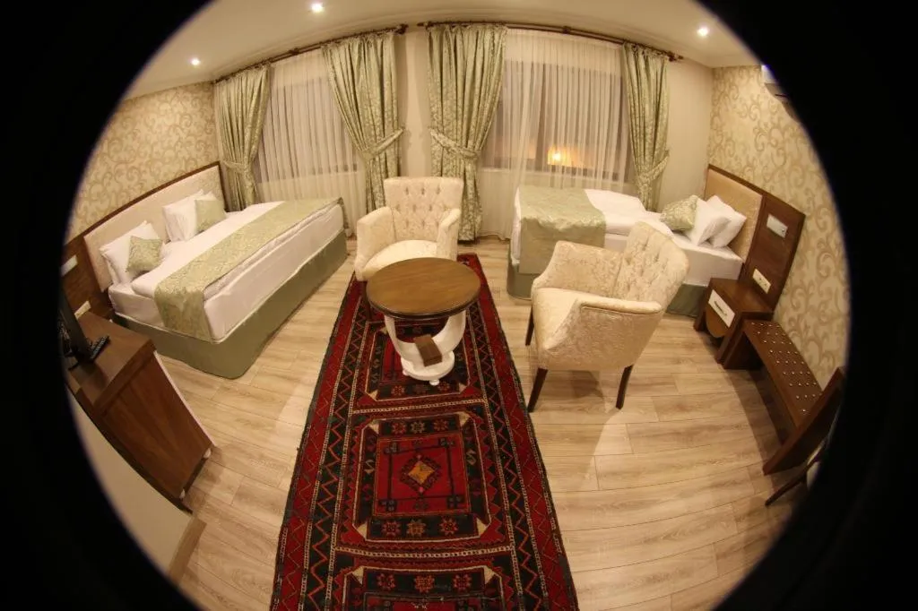 Photo of the whole room, Bed in Tuğhan Hotel