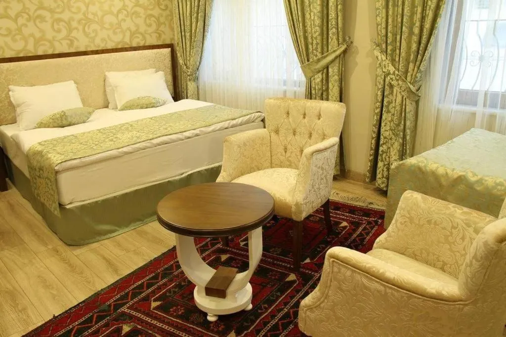 Photo of the whole room, Bed in Tuğhan Hotel