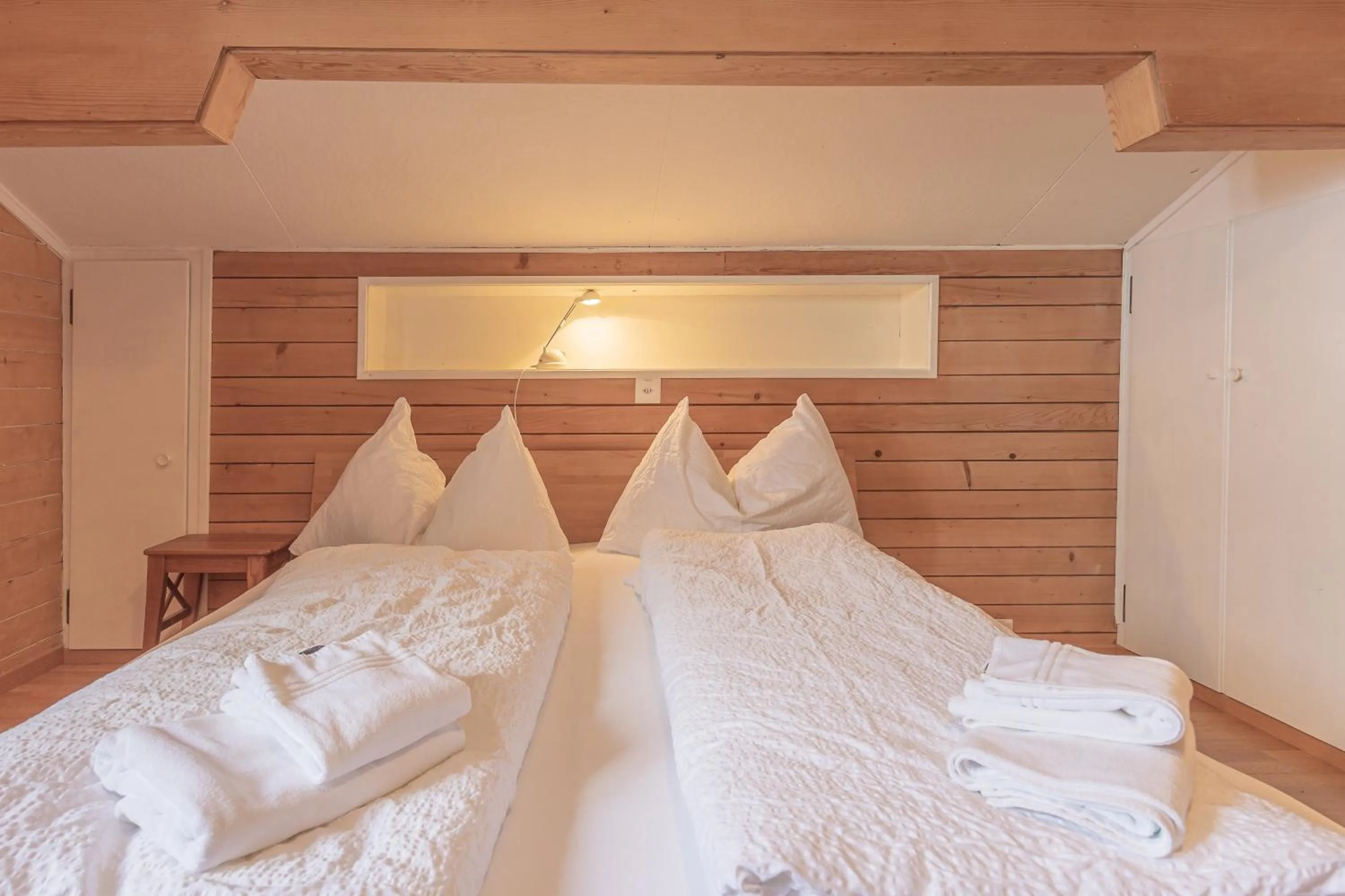 Bed in Berghaus Niederhorn