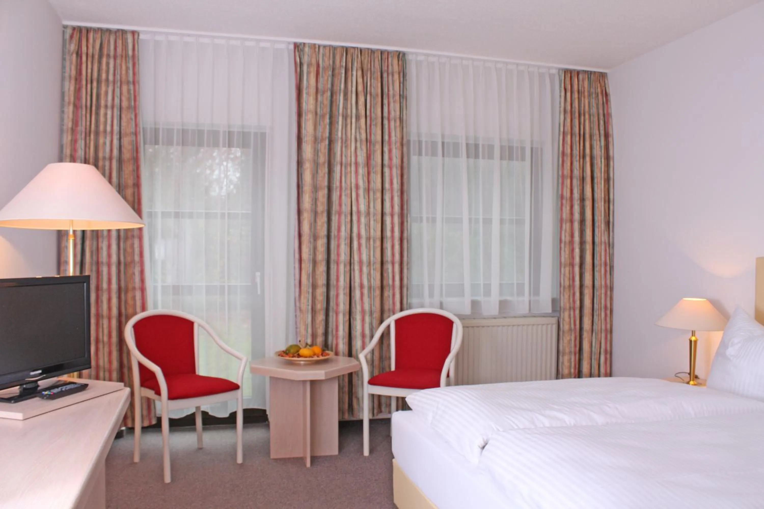 Seating area, Bed in Lindenhotel Stralsund