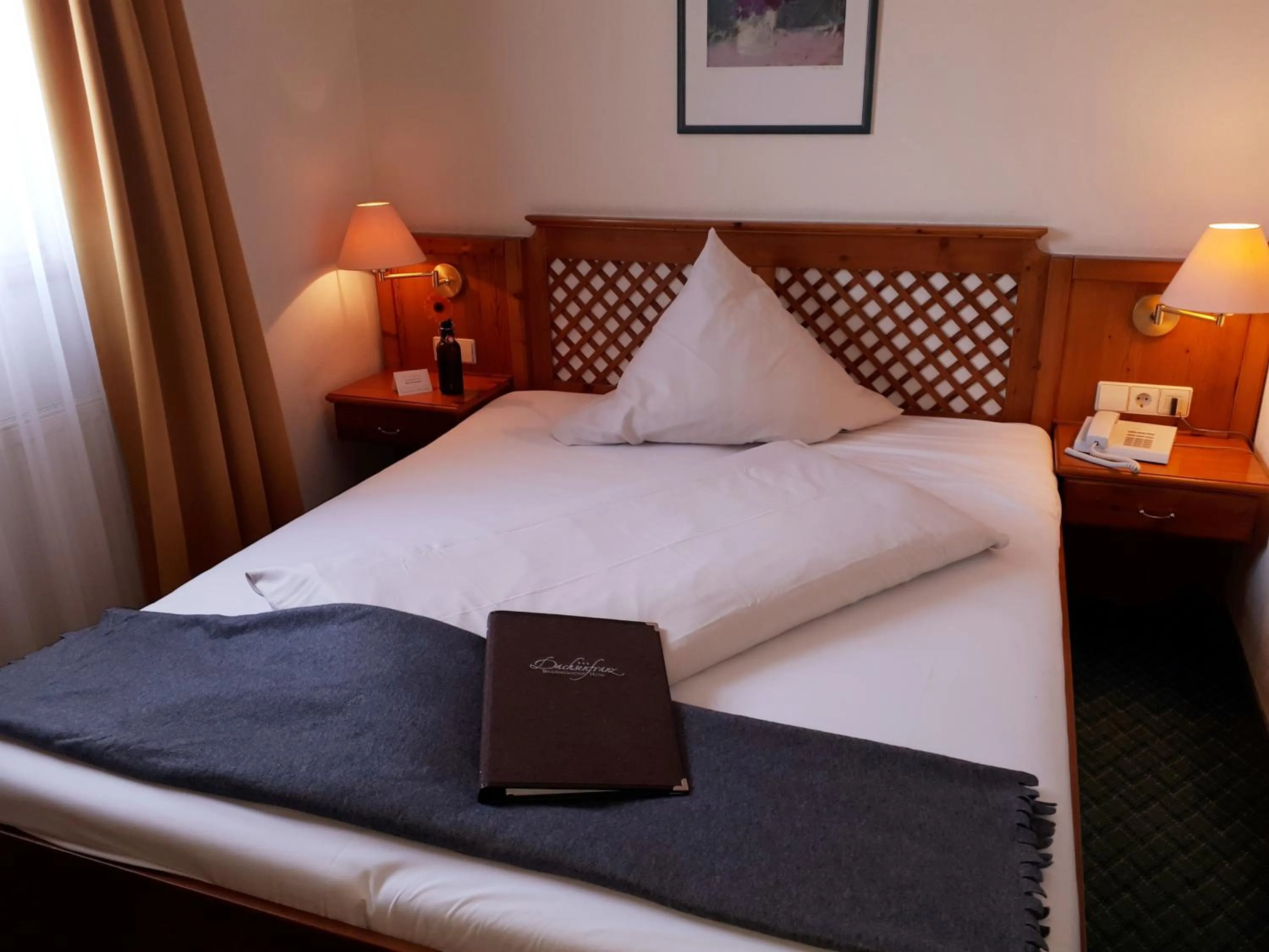 Bed in Brauereigasthof Dachsenfranz