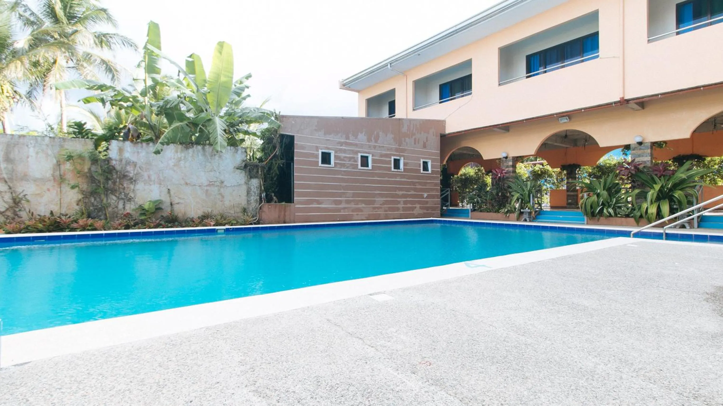 Pool view in RedDoorz Plus near Municipality of Luisiana Laguna