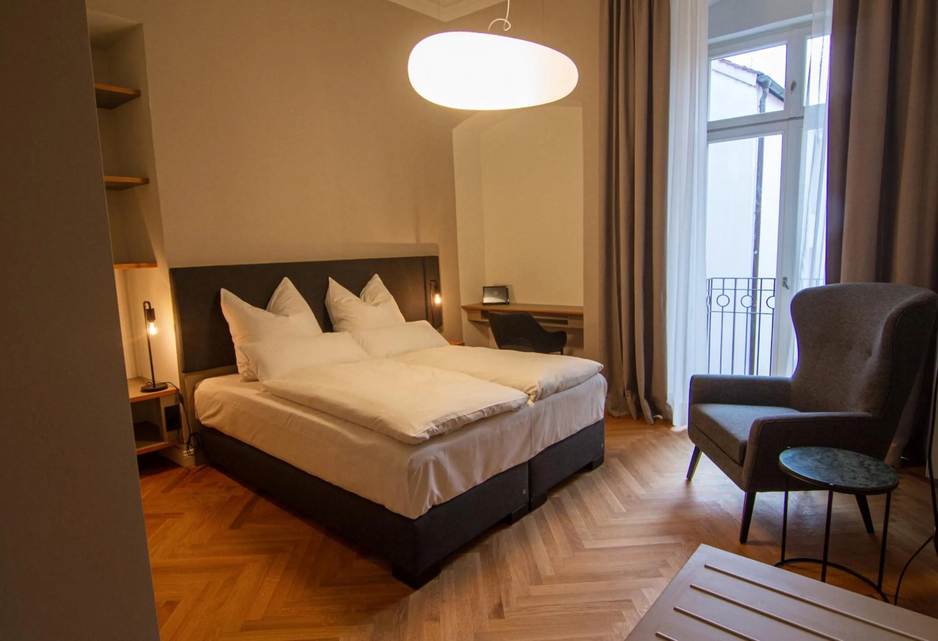 Photo of the whole room, Bed in Le Baldinger Boutique Hotel
