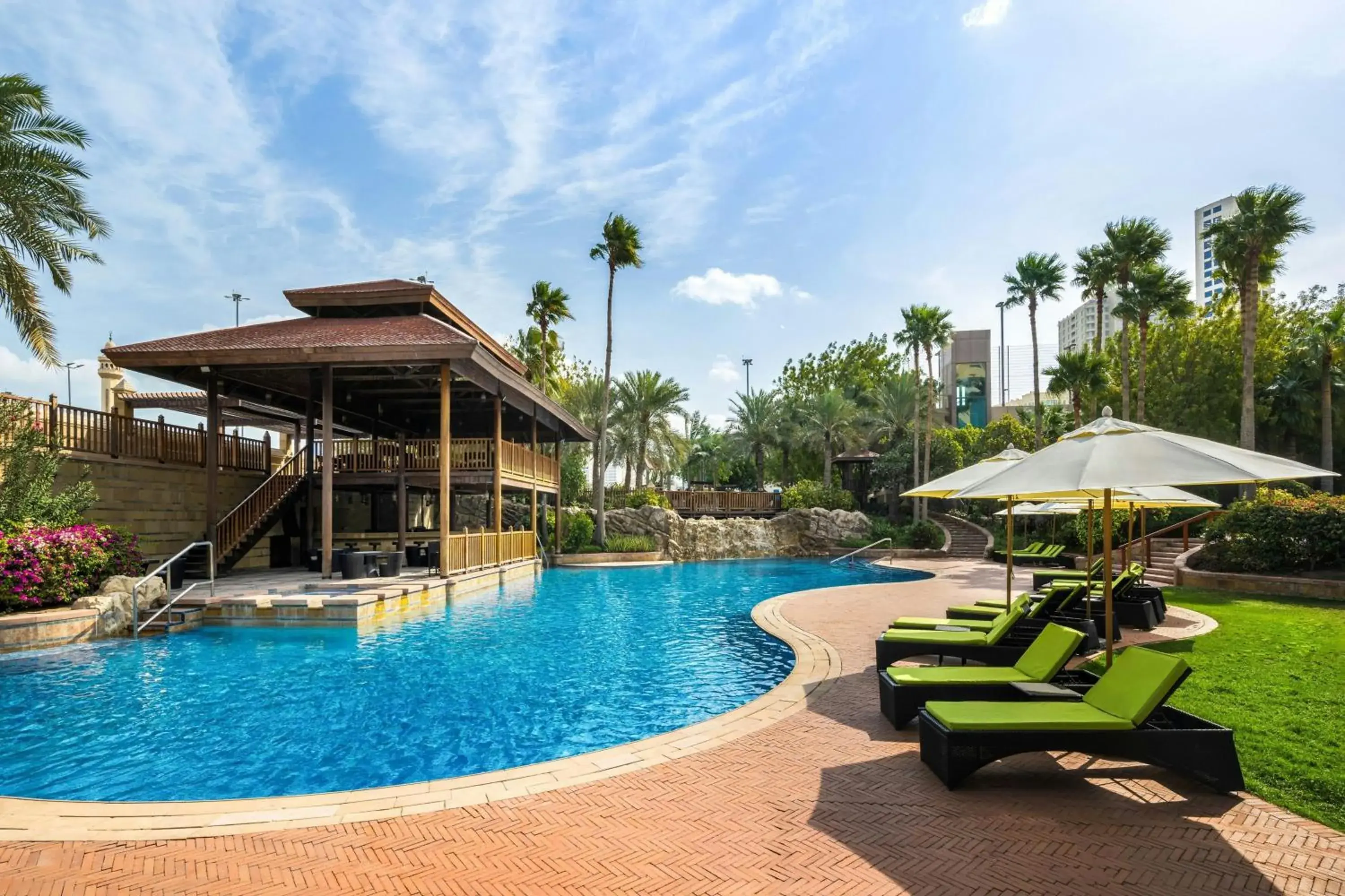 Swimming pool in Gulf Hotel Bahrain Convention and SPA Swimming pool in Gulf Hotel Bahrain Convention and SPA