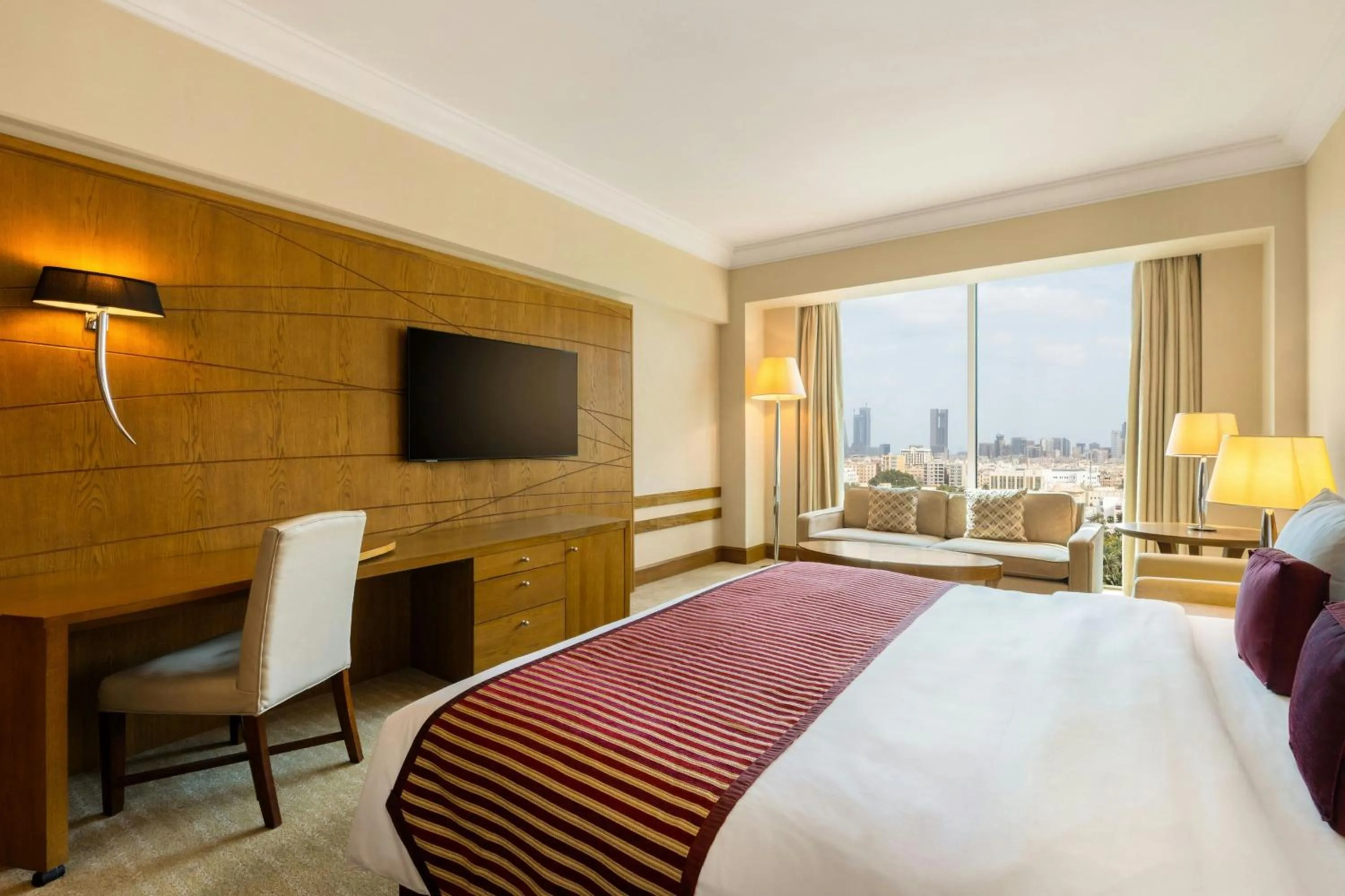 Photo of the whole room, Bed in Gulf Hotel Bahrain Convention and SPA