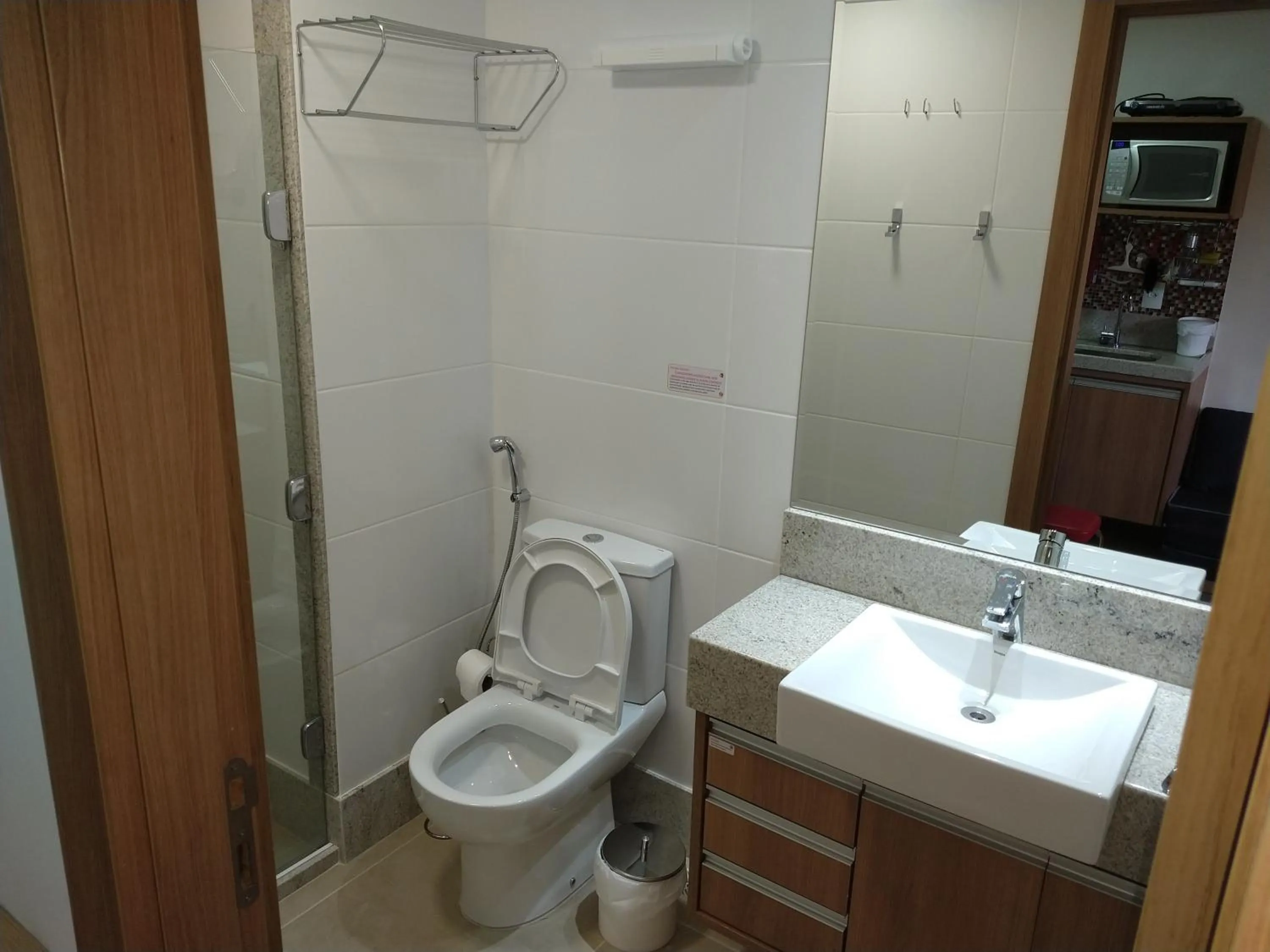 Living room in Suíte Charmosa em Pedra Azul