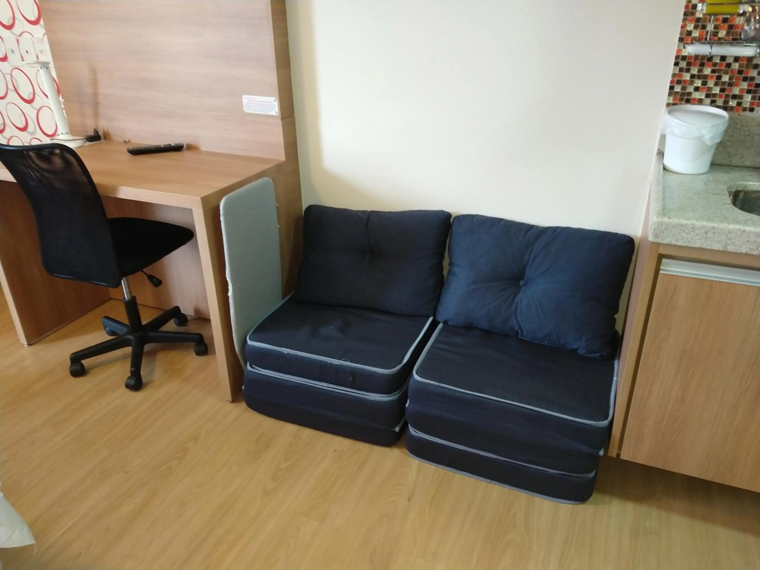 Living room in Suíte Charmosa em Pedra Azul