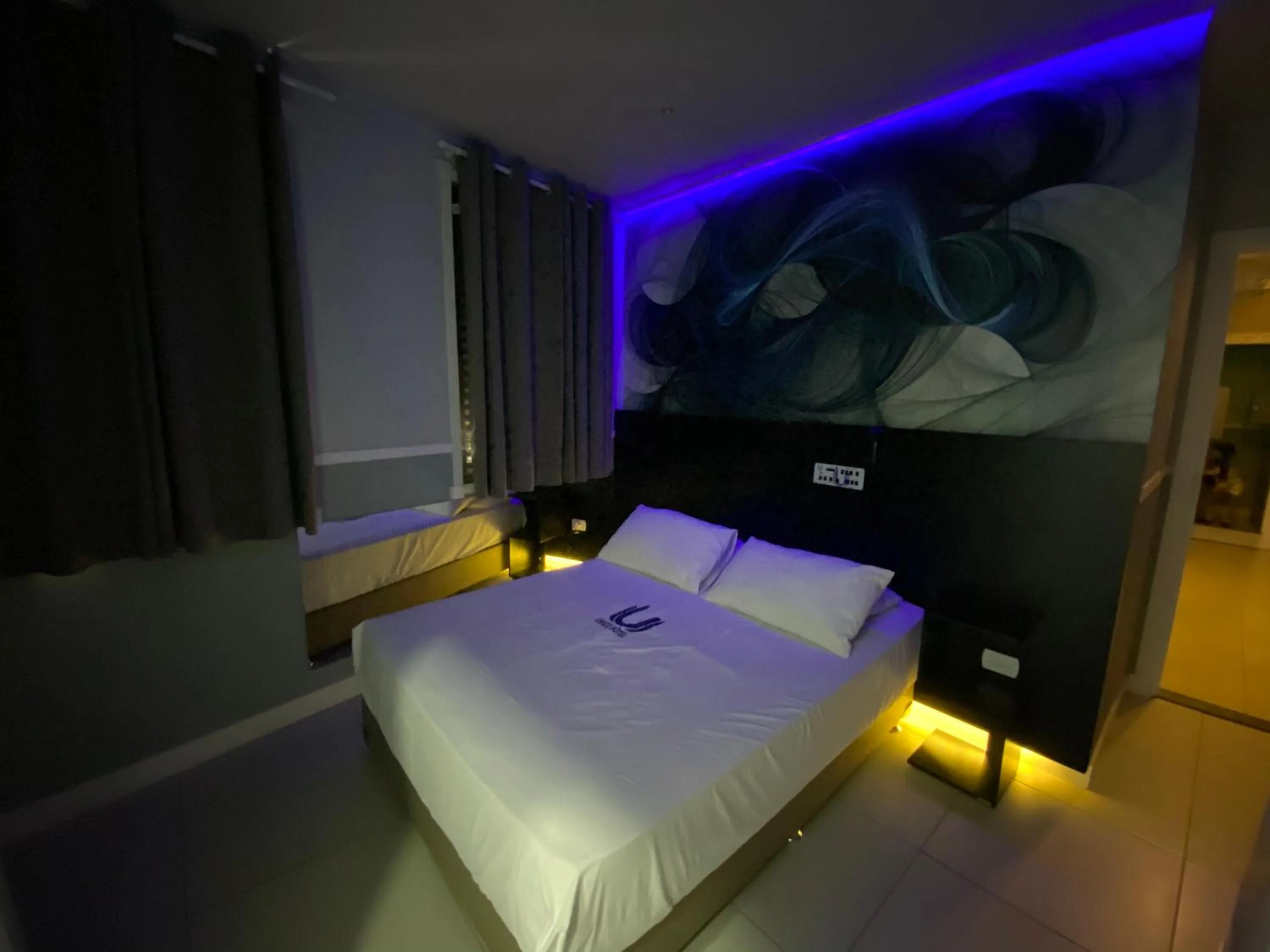 Bed in Único Motel Faria Lima