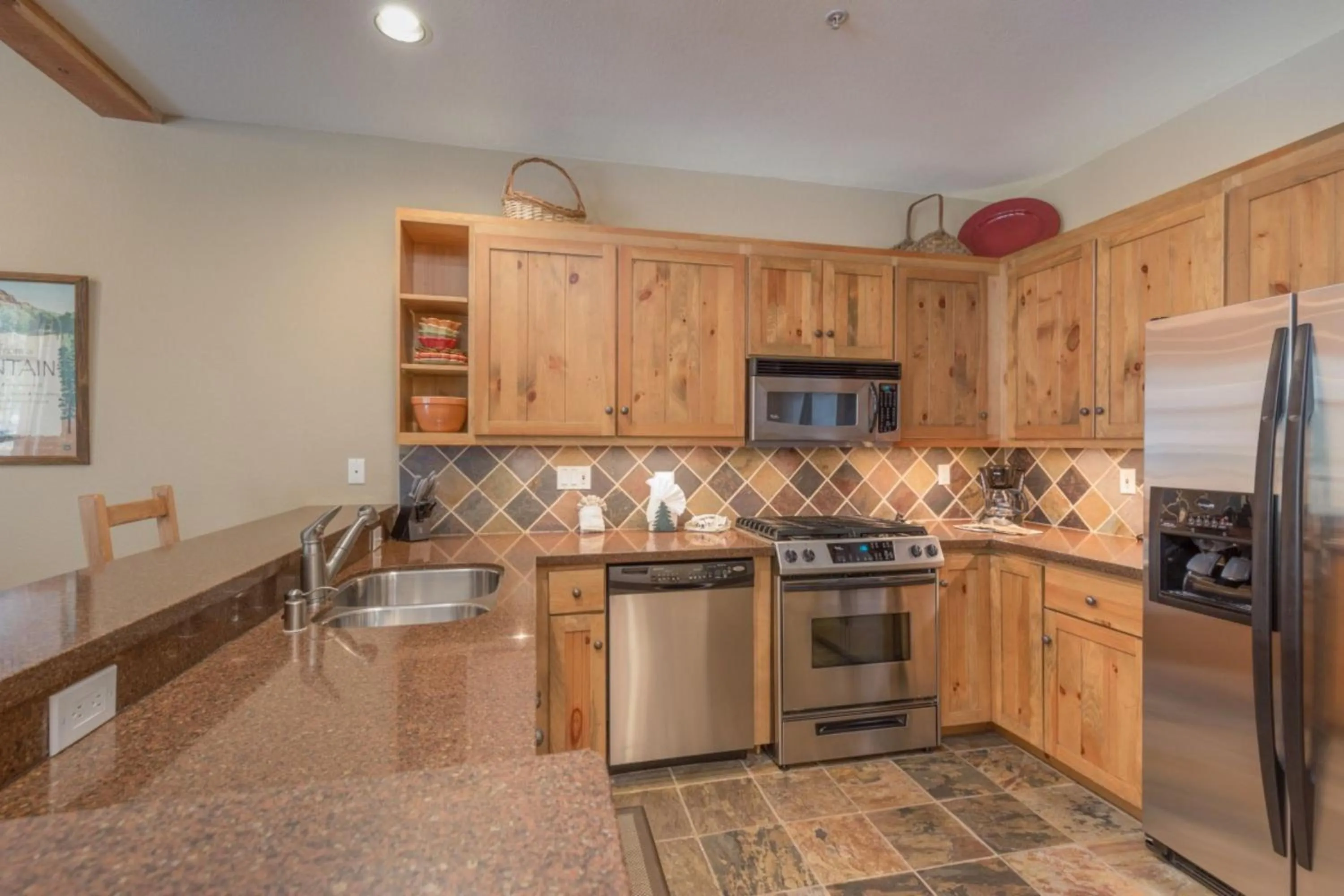 Kitchen or kitchenette in Ski Tip by Summit County Mountain Retreats