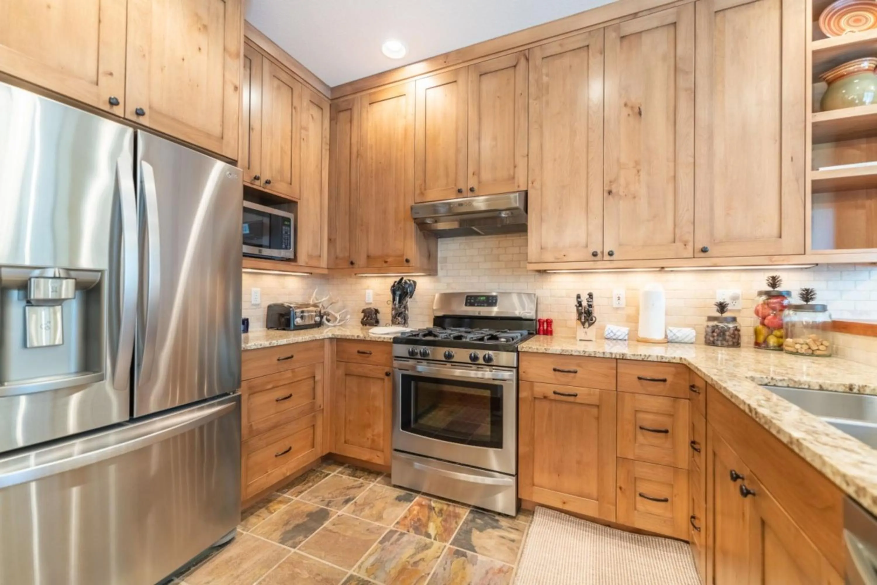 Kitchen or kitchenette in Ski Tip by Summit County Mountain Retreats