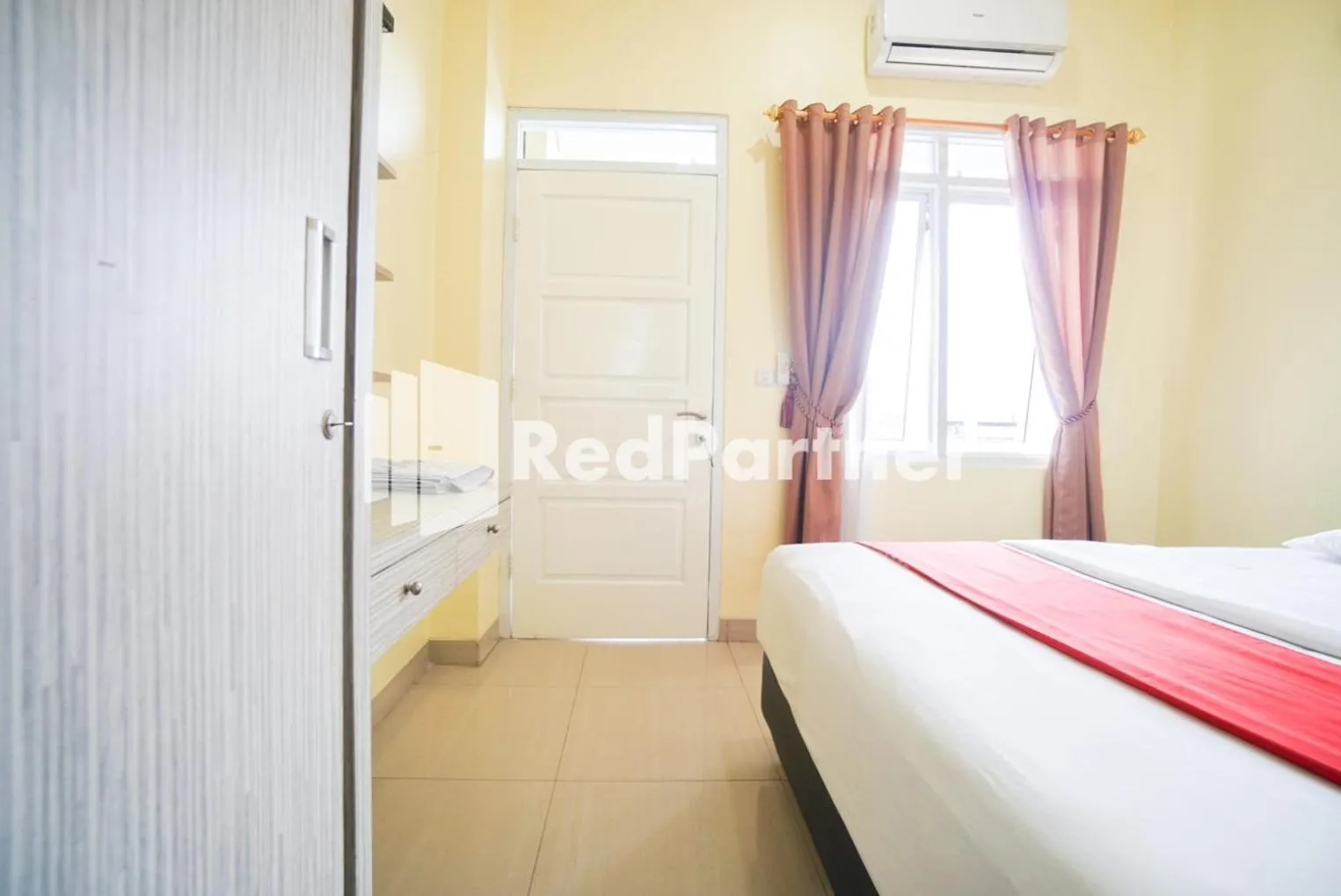 Bed in Indah Residence Syariah Mitra RedDoorz
