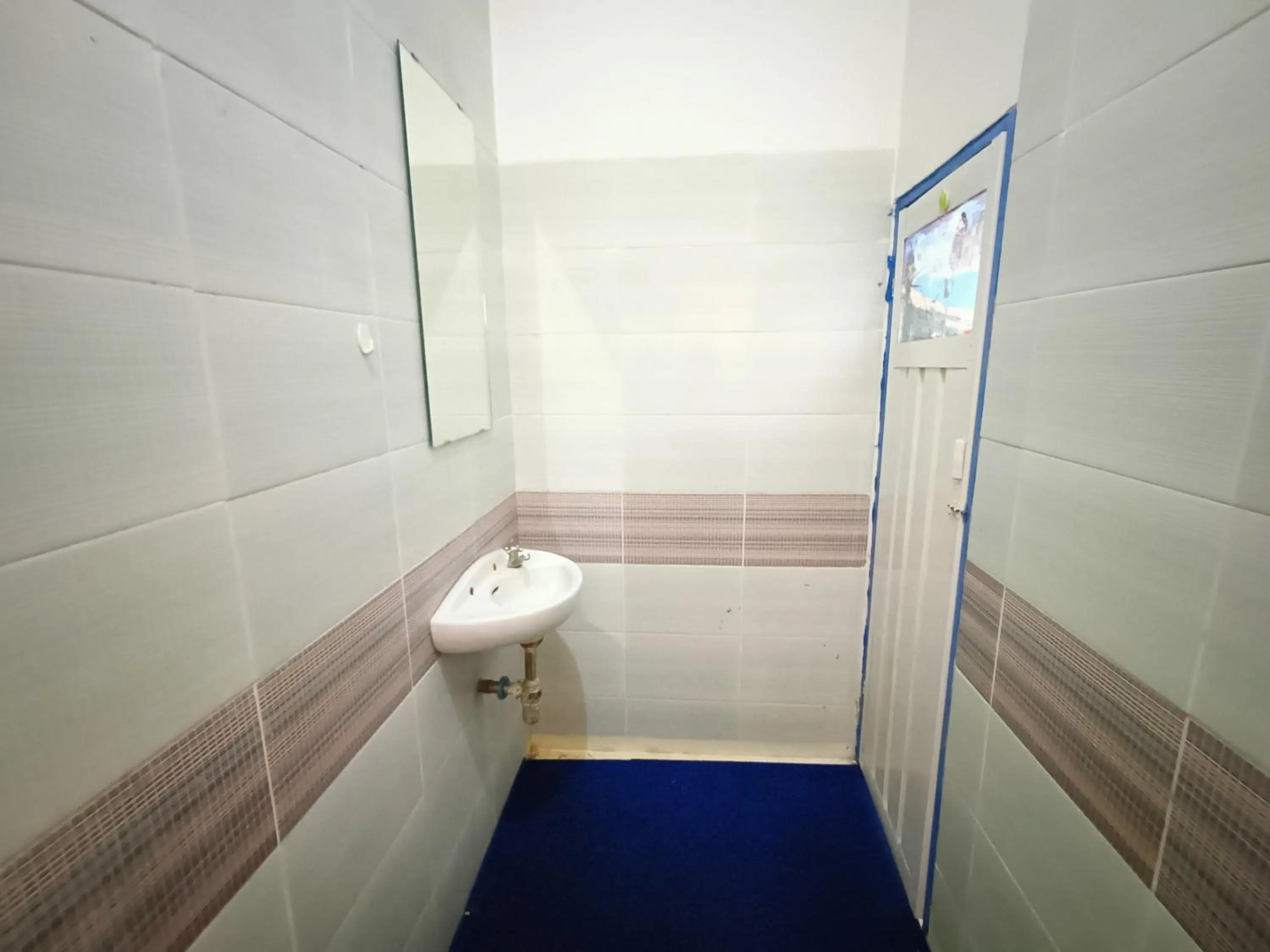 Bathroom in Bumi Merpati Residence Makassar Mitra RedDoorz