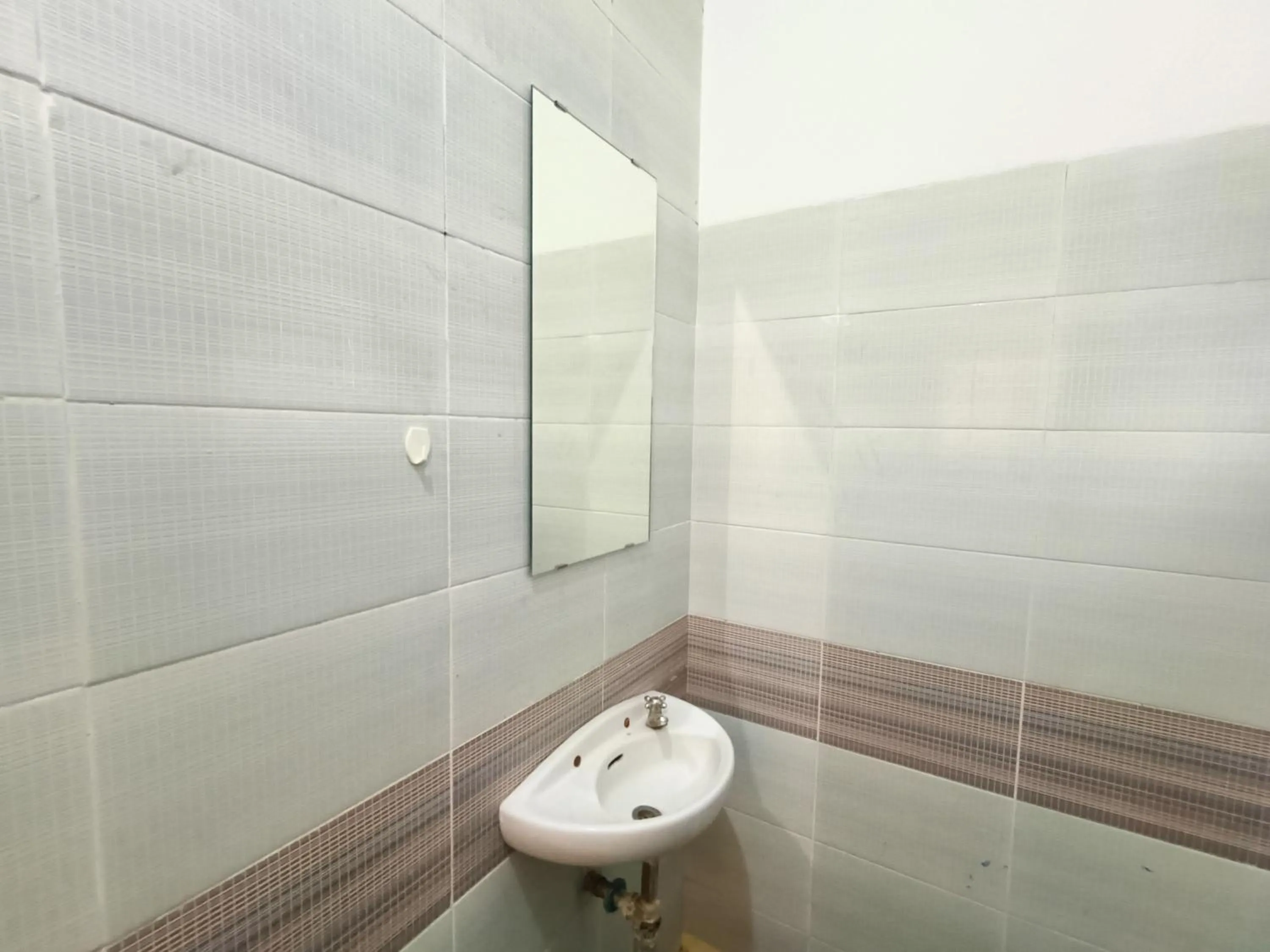 Bathroom in Bumi Merpati Residence Makassar Mitra RedDoorz