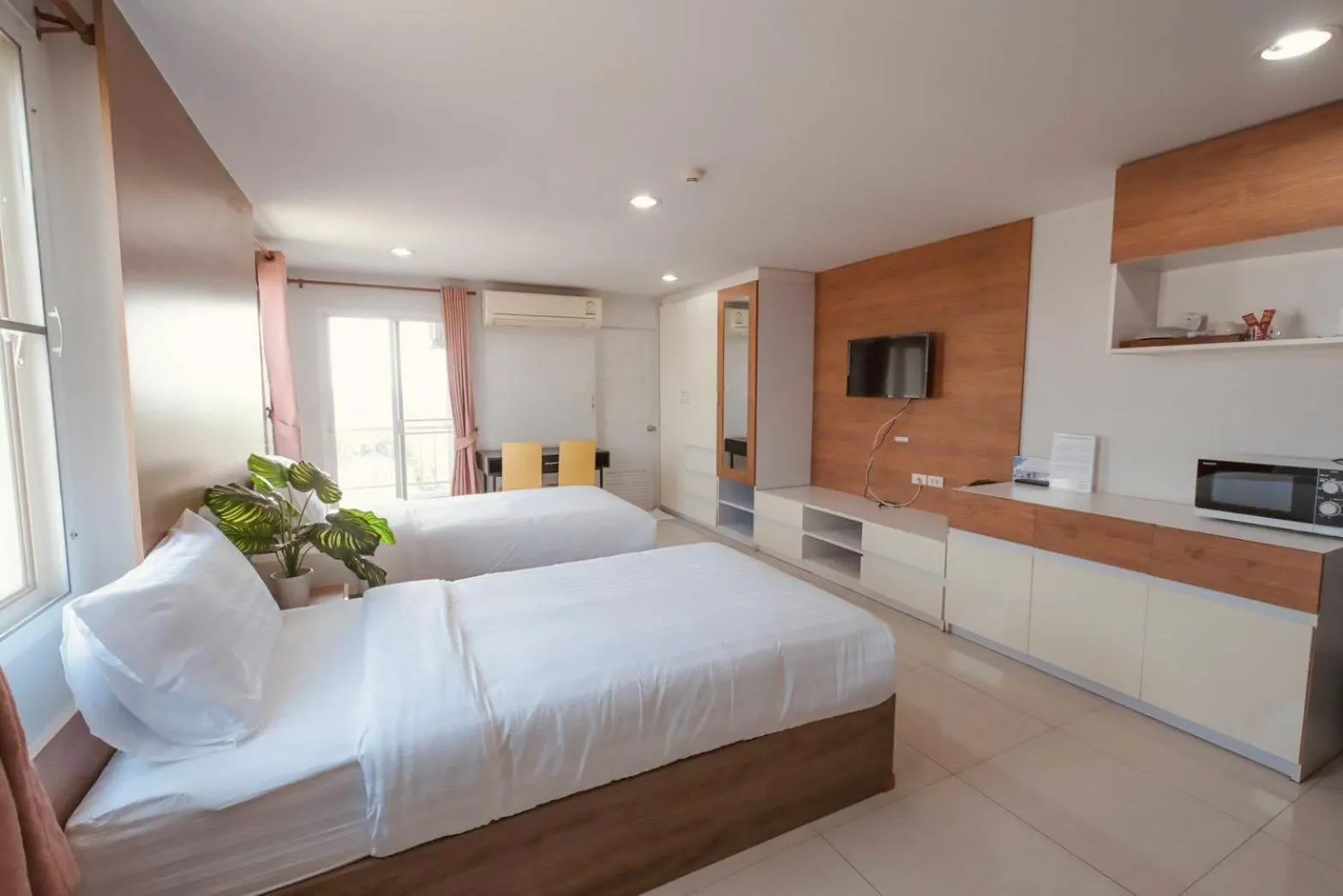 Photo of the whole room, Bed in The Seasons