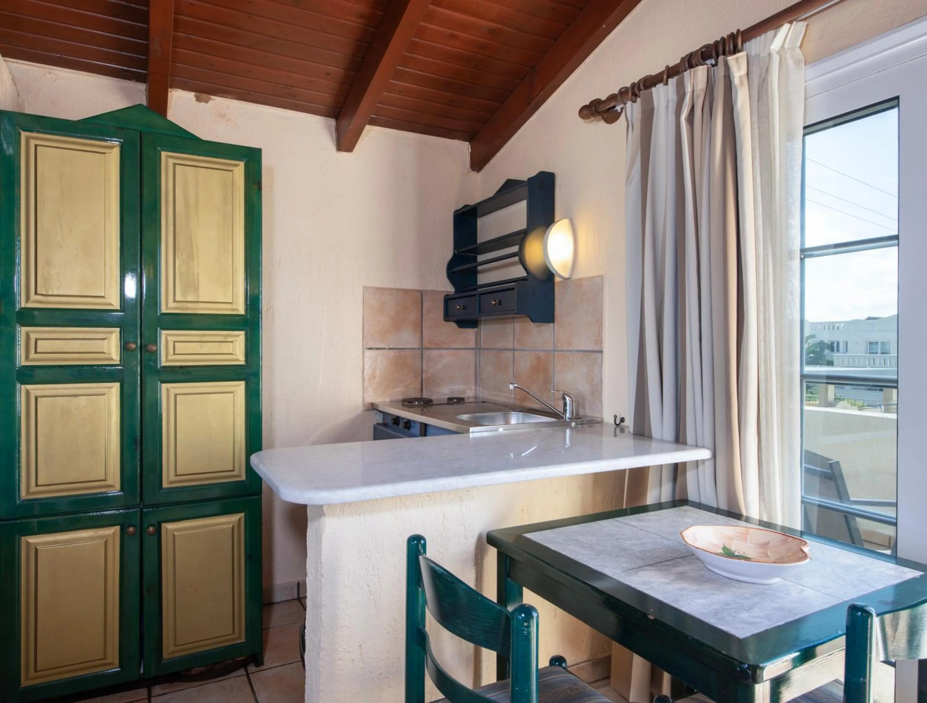 Kitchen or kitchenette in Castle Suites Hotel