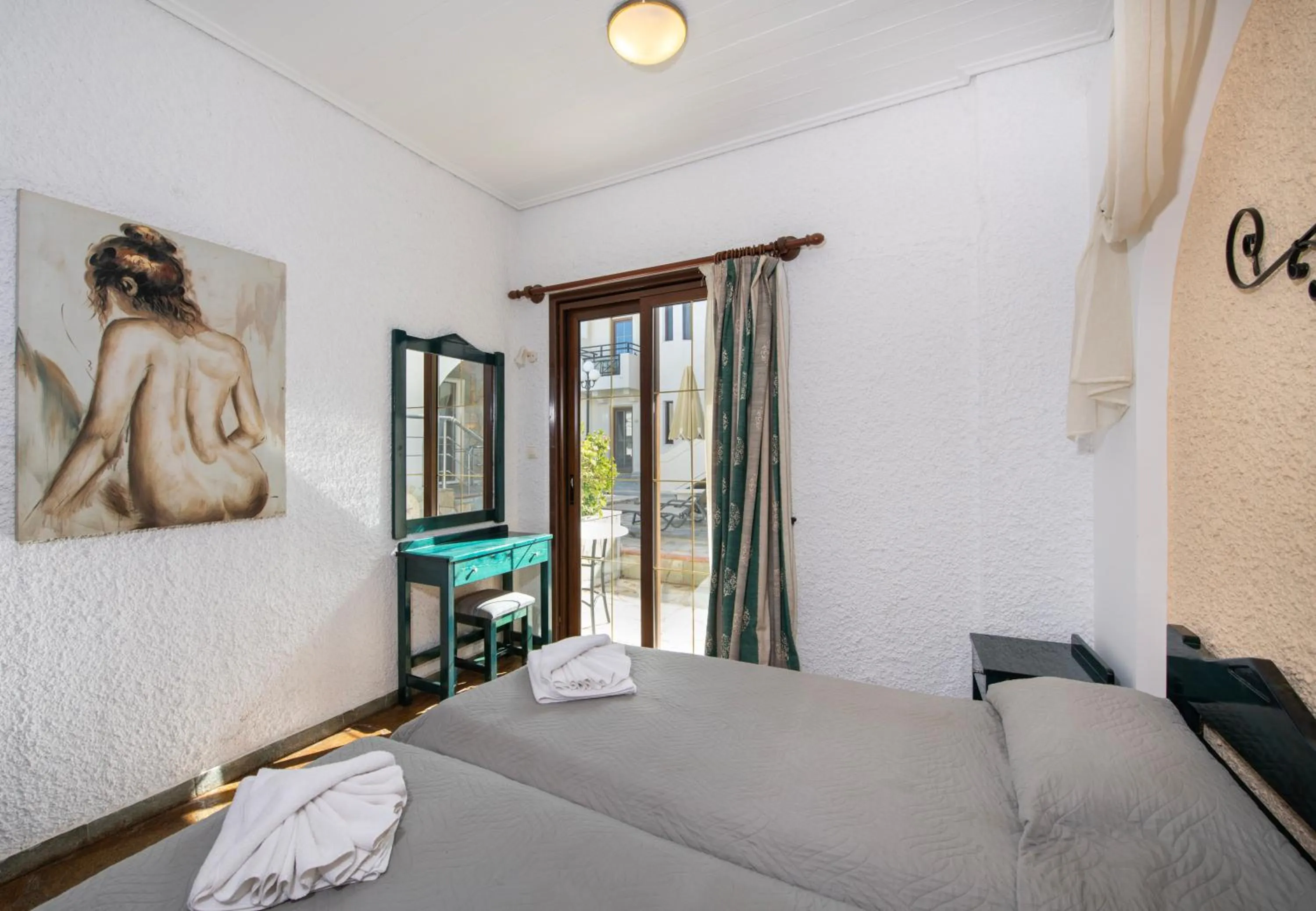 Bed in Castle Suites Hotel