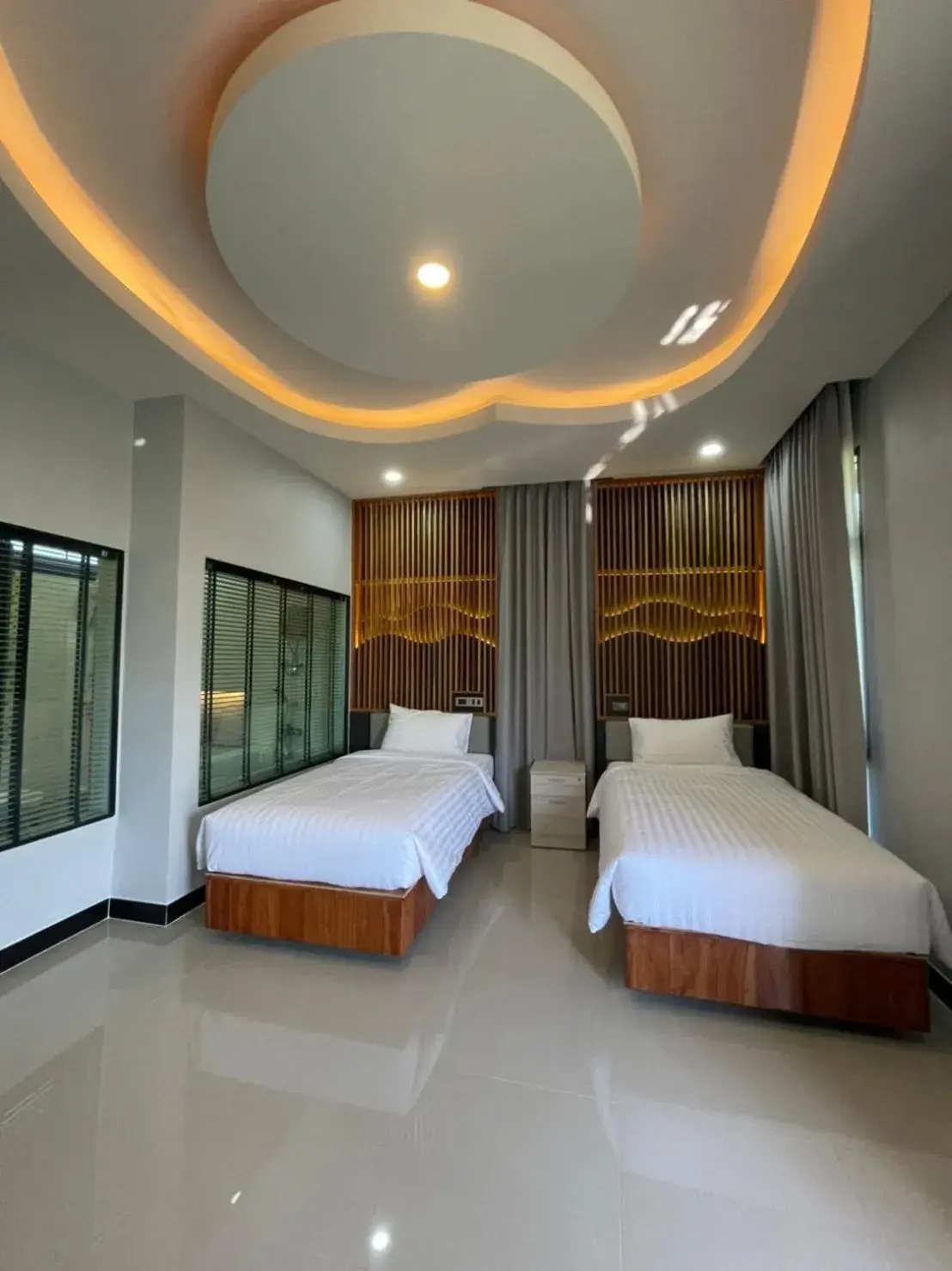 Photo of the whole room, Bed in Phutara Resort and Spa Photo of the whole room, Bed in Phutara Resort and Spa