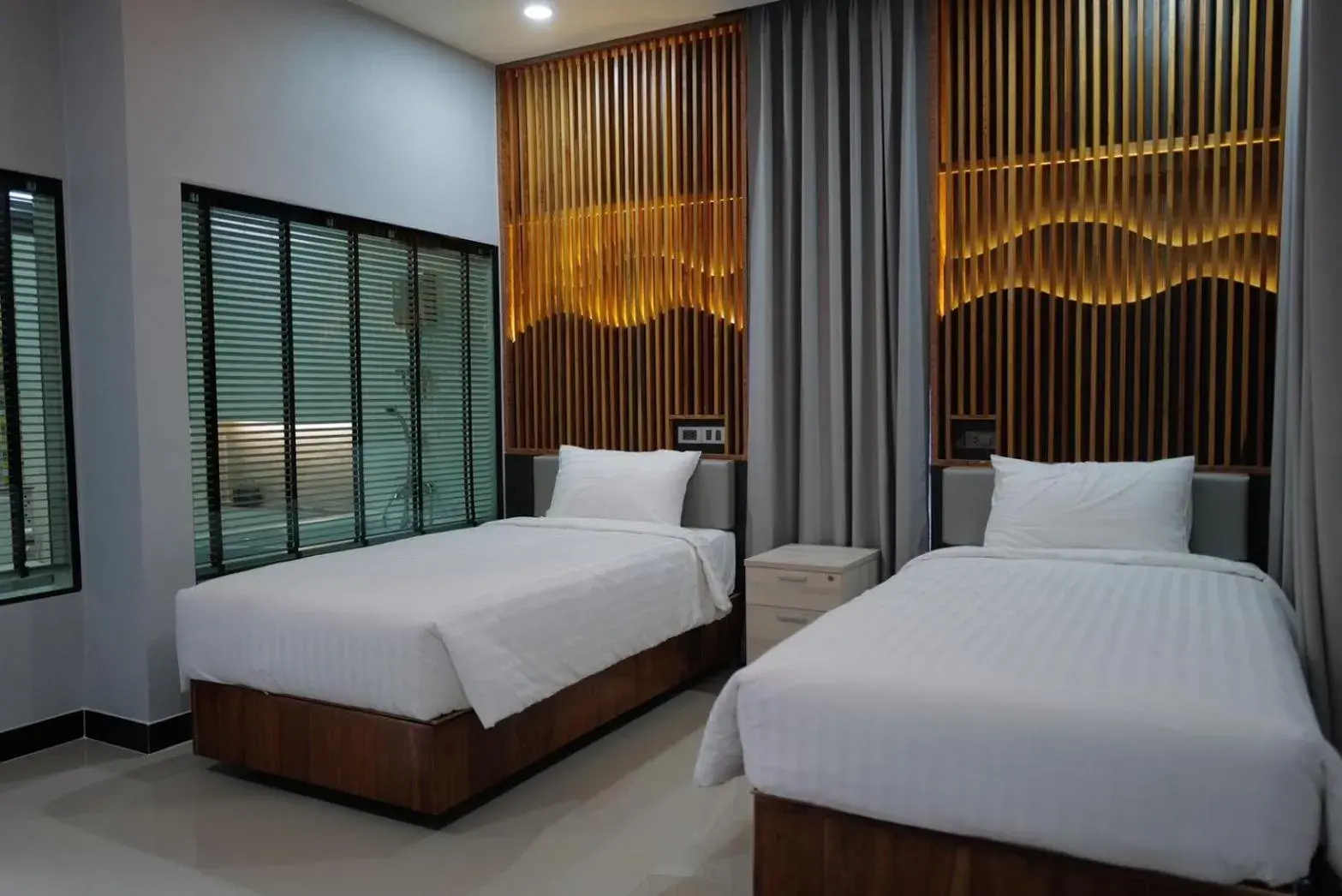 Bedroom, Bed in Phutara Resort and Spa Bedroom, Bed in Phutara Resort and Spa