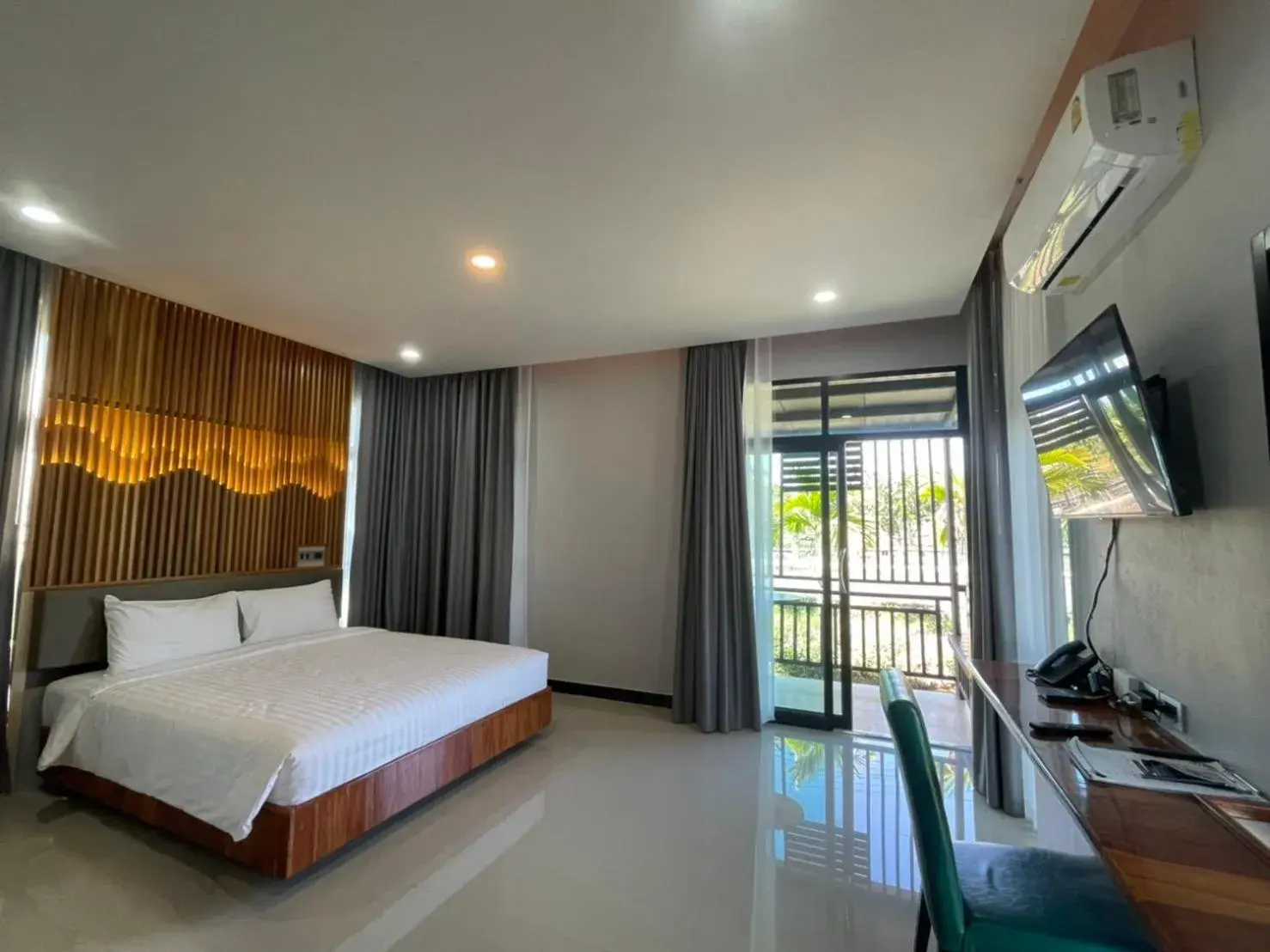 Photo of the whole room, Bed in Phutara Resort and Spa Photo of the whole room, Bed in Phutara Resort and Spa