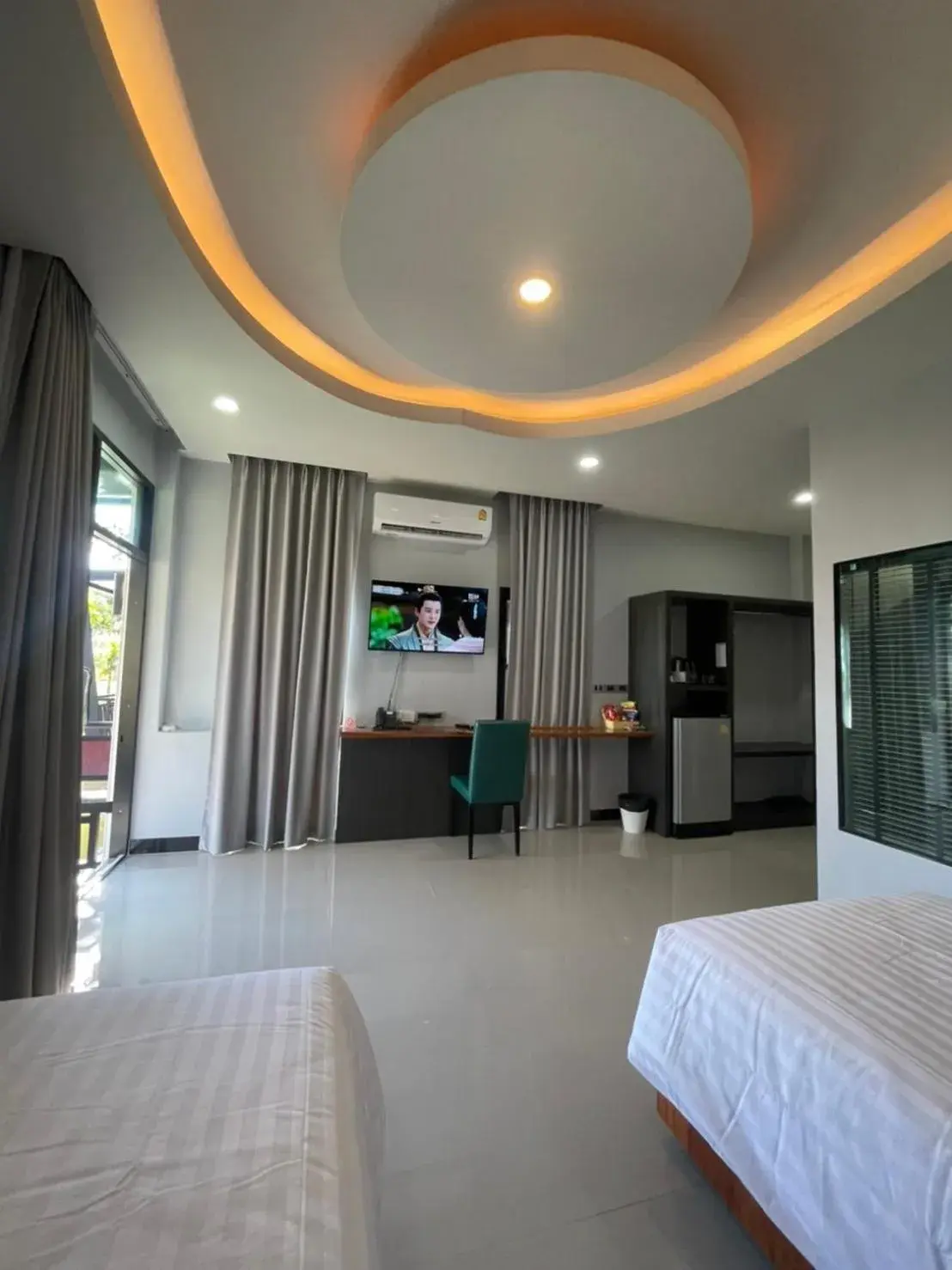 Photo of the whole room, Bed in Phutara Resort and Spa Photo of the whole room, Bed in Phutara Resort and Spa