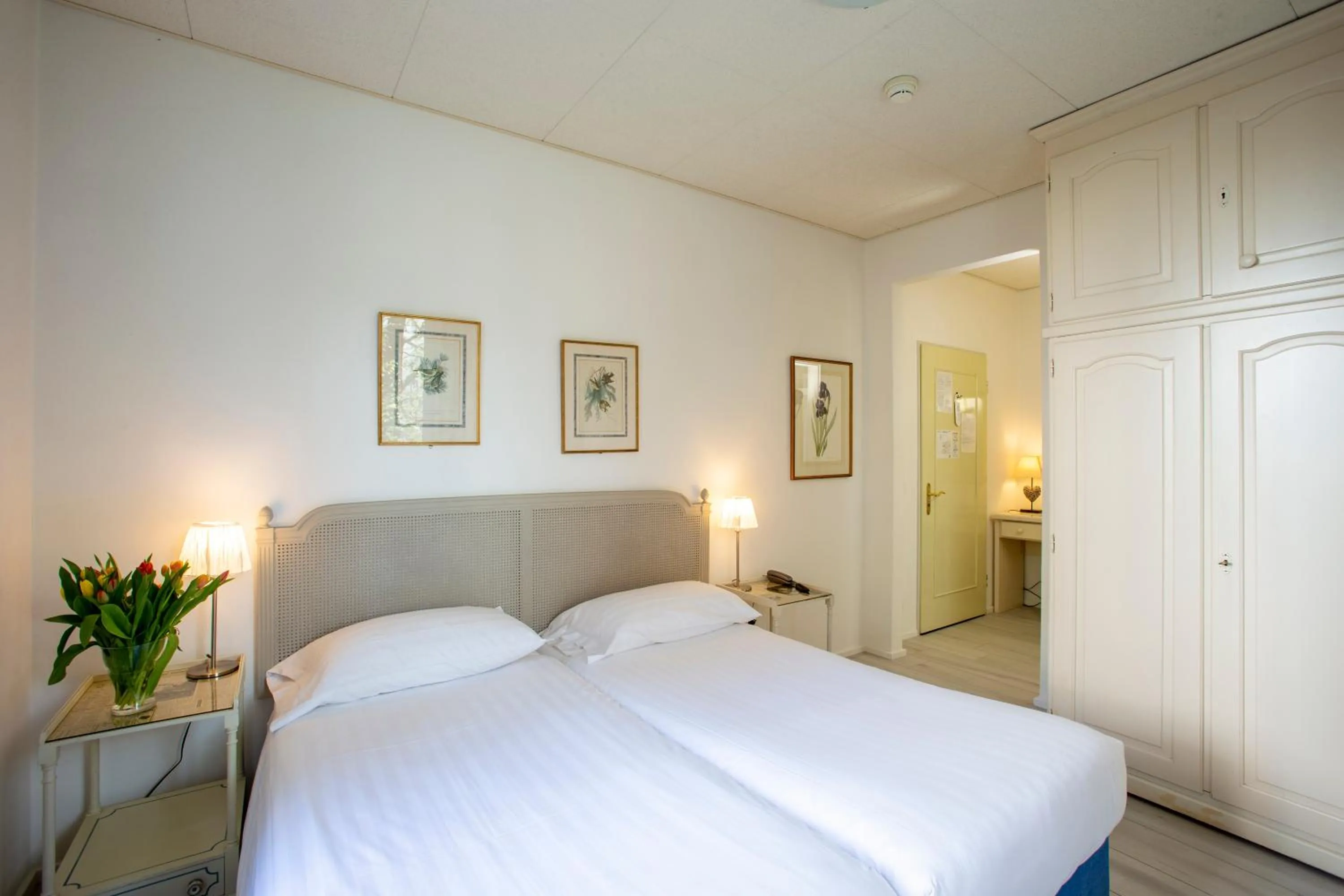 Bed in Piccolo Hotel