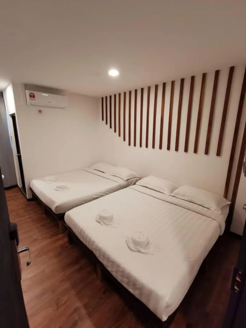 Bed in Kuching Hotel