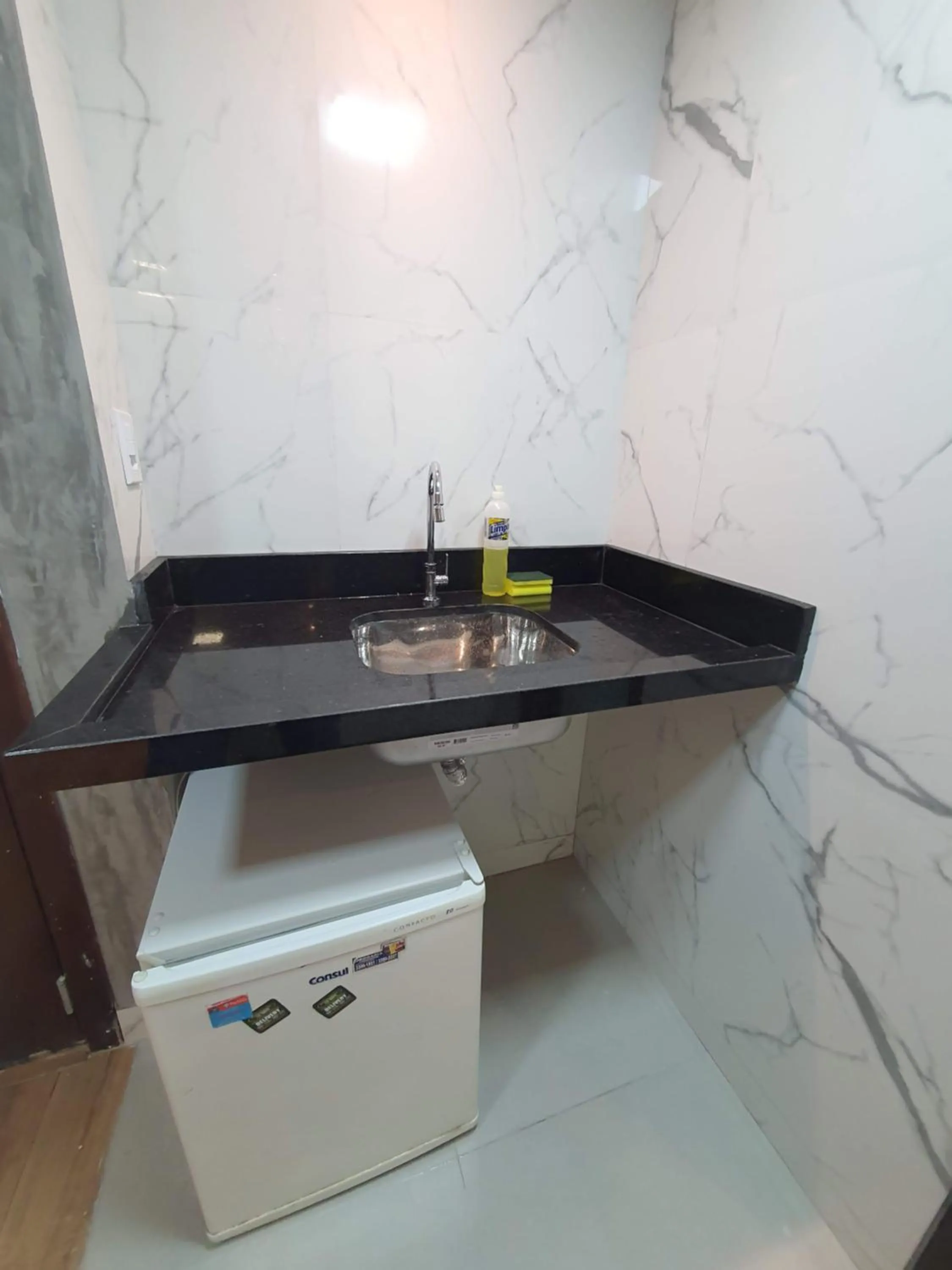 Kitchen or kitchenette in Lake Side Beira do Lago - piscina - academia - sauna- By Rei dos Flats