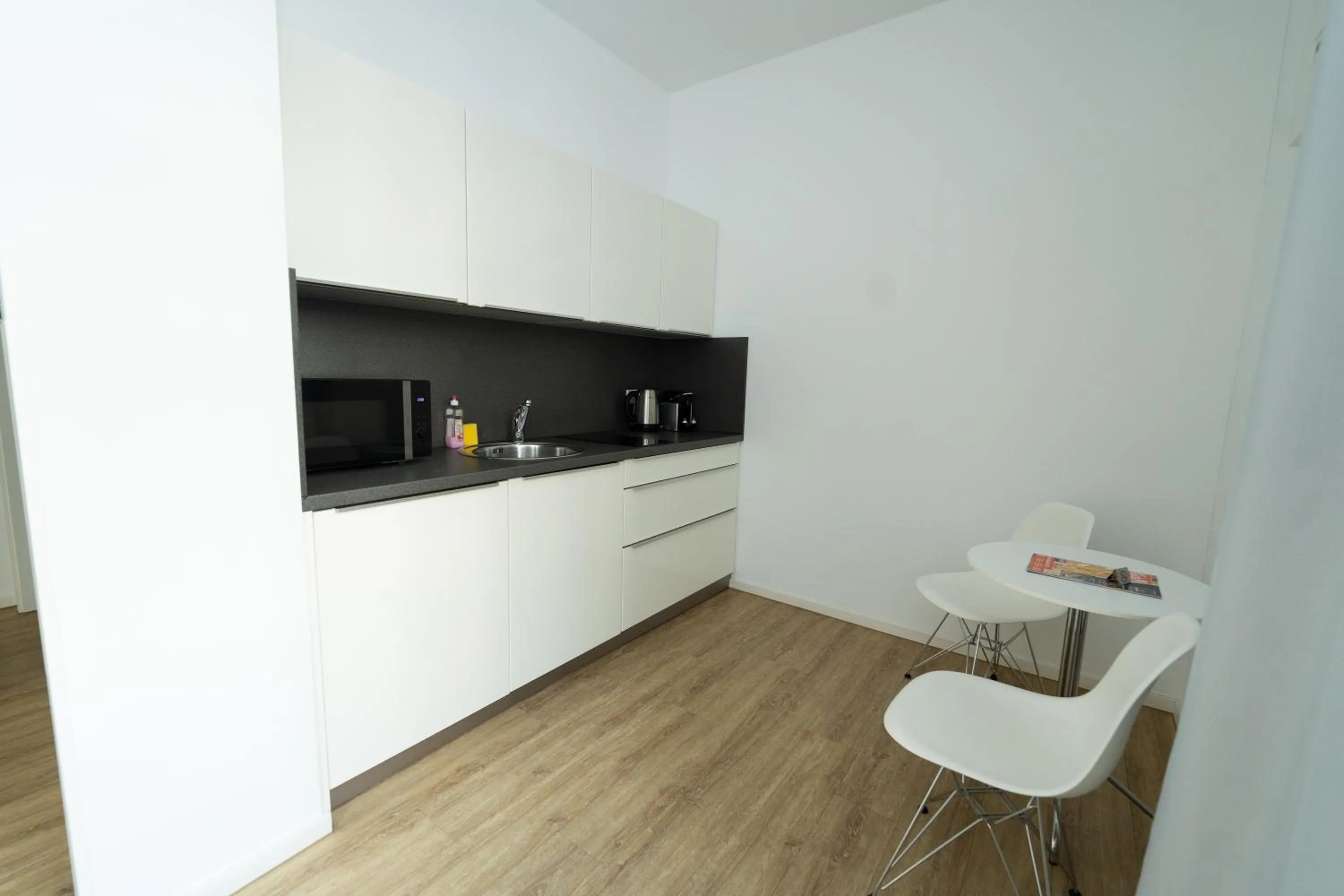 Kitchen or kitchenette in Das Loft Apartments