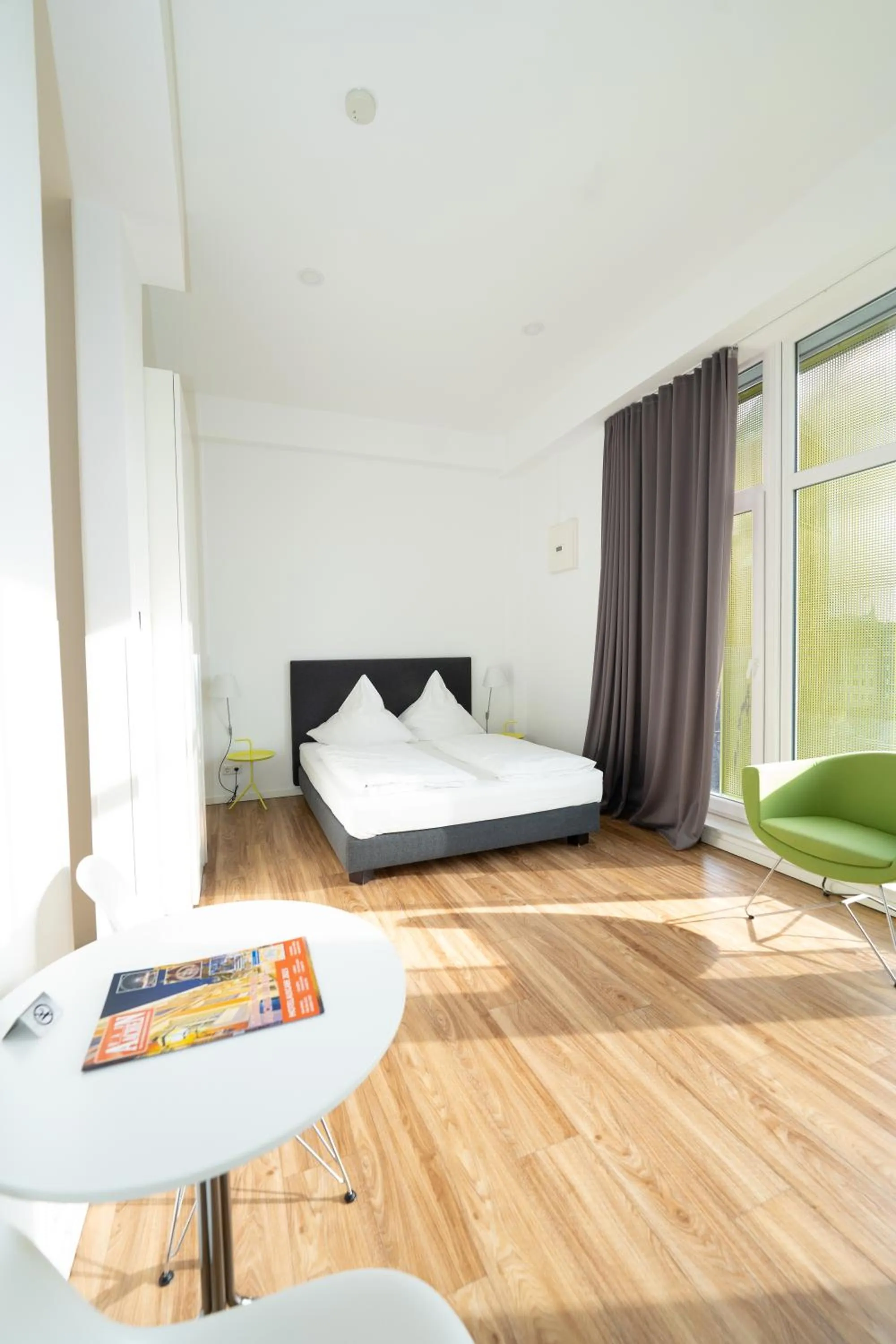 Bed in Das Loft Apartments