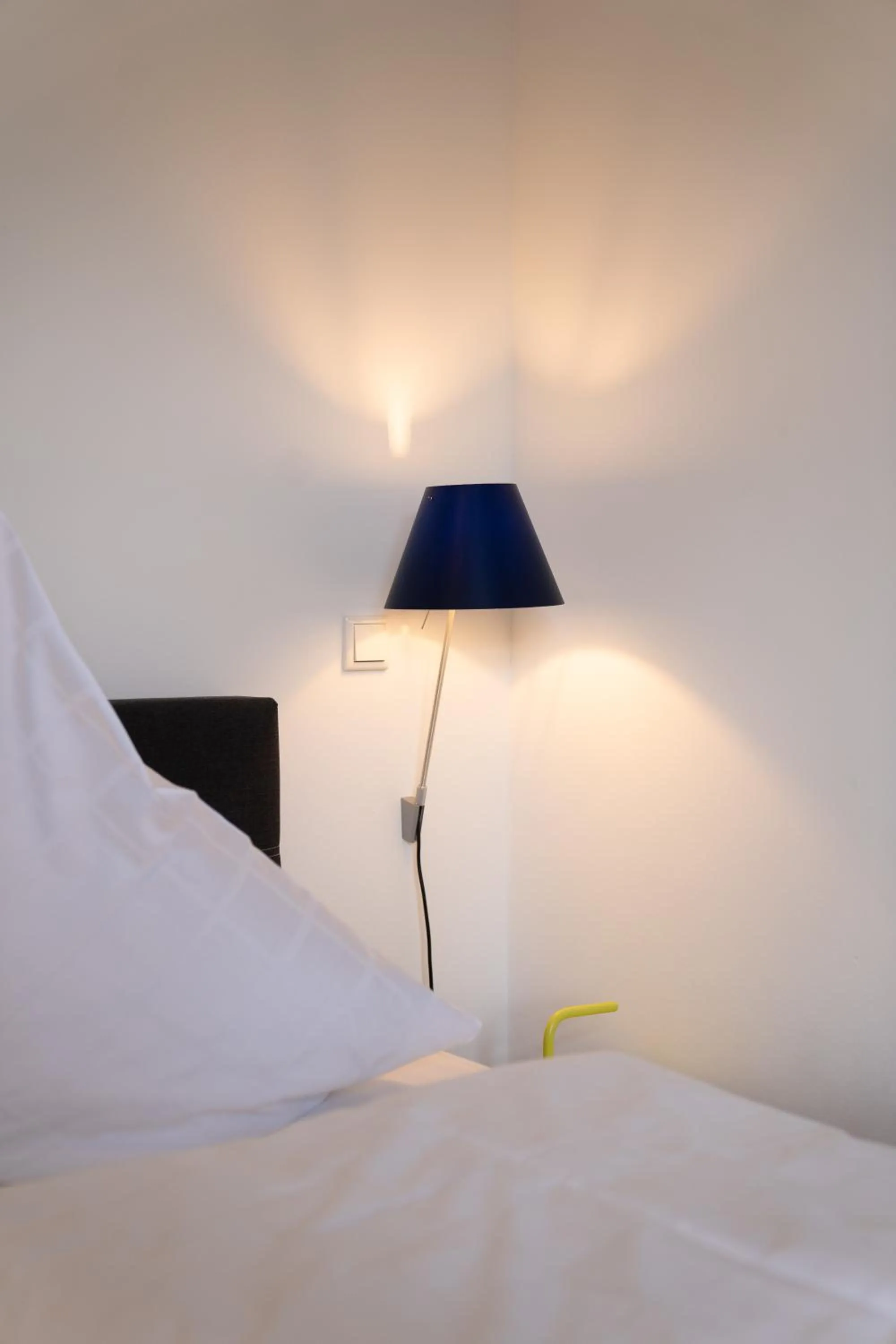 Bed in Das Loft Apartments