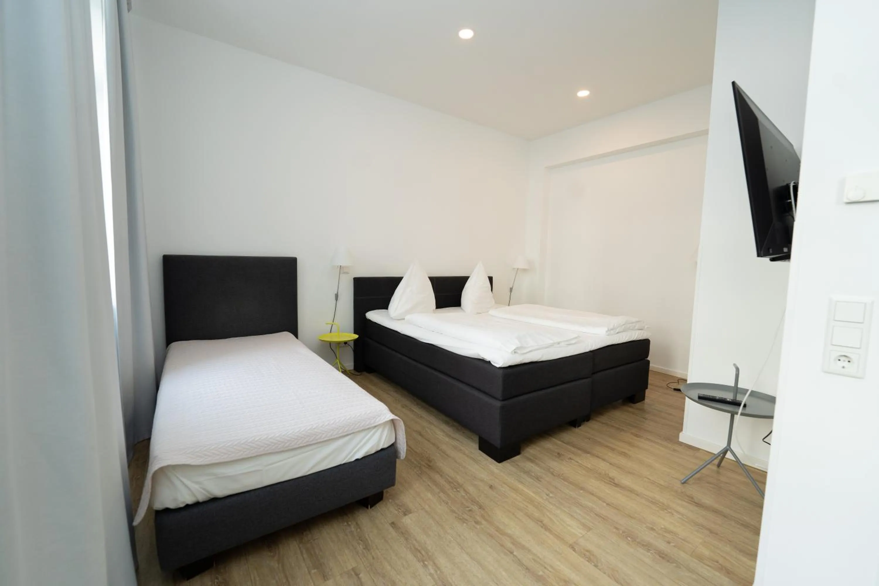 Bed in Das Loft Apartments