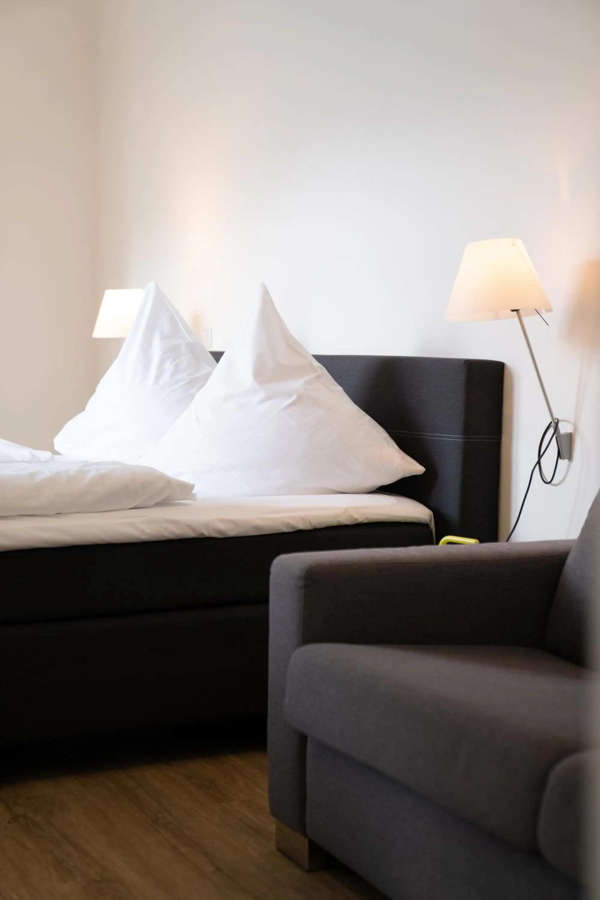 Bed in Das Loft Apartments