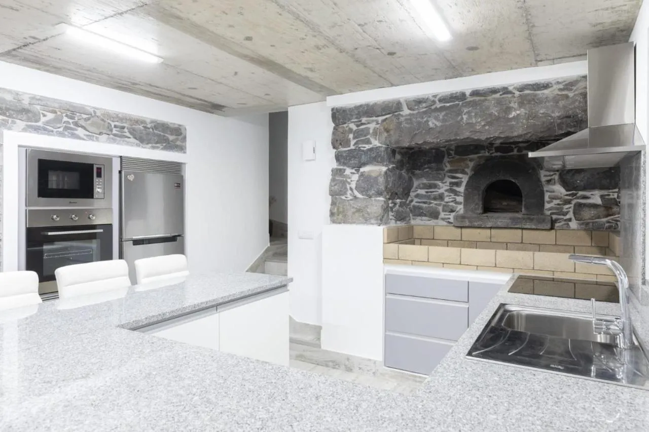 kitchen in Stay in our cozy and wonderful Casa da Rosinha