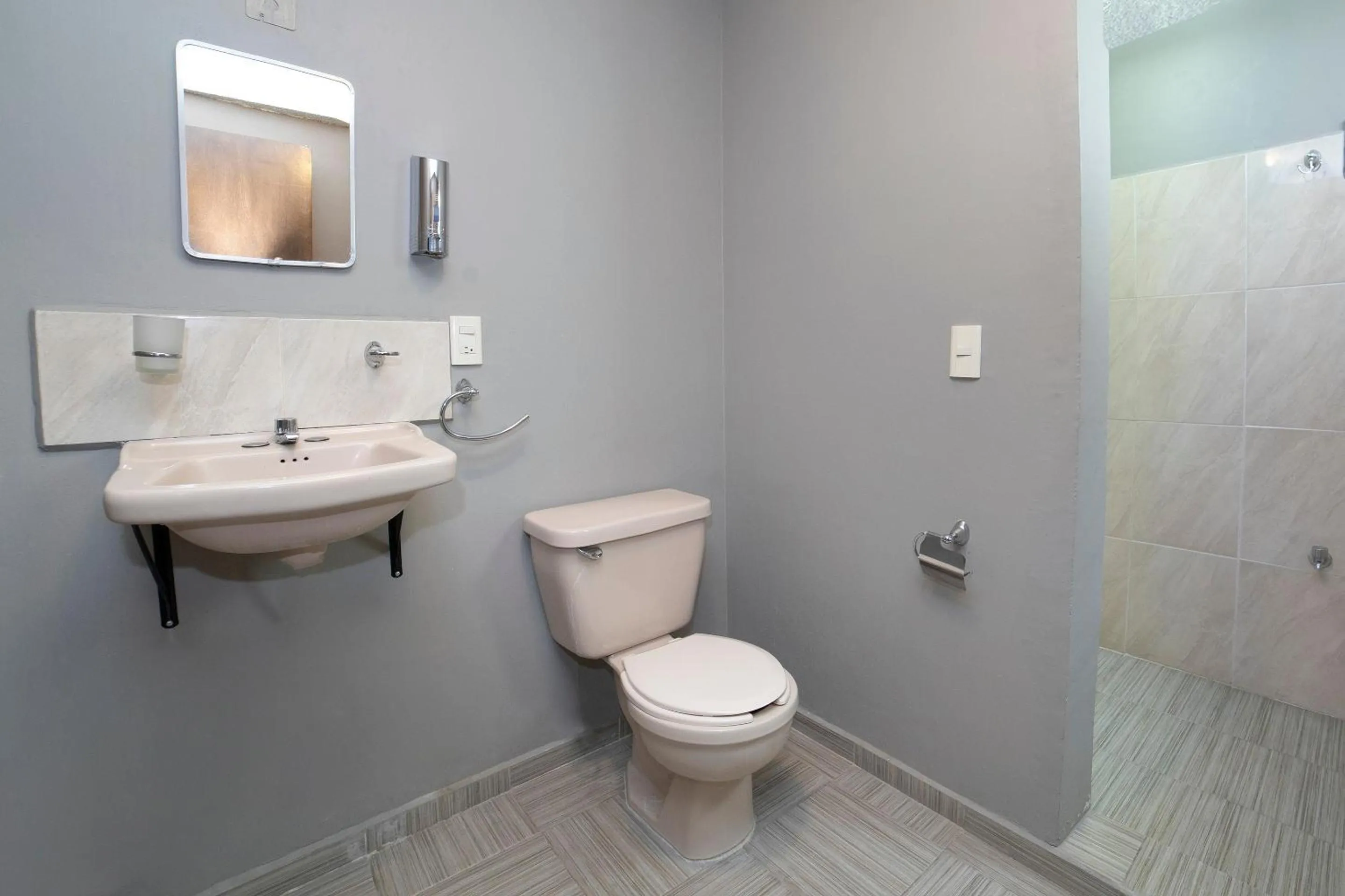 Bathroom in Capital O Hotel Diez