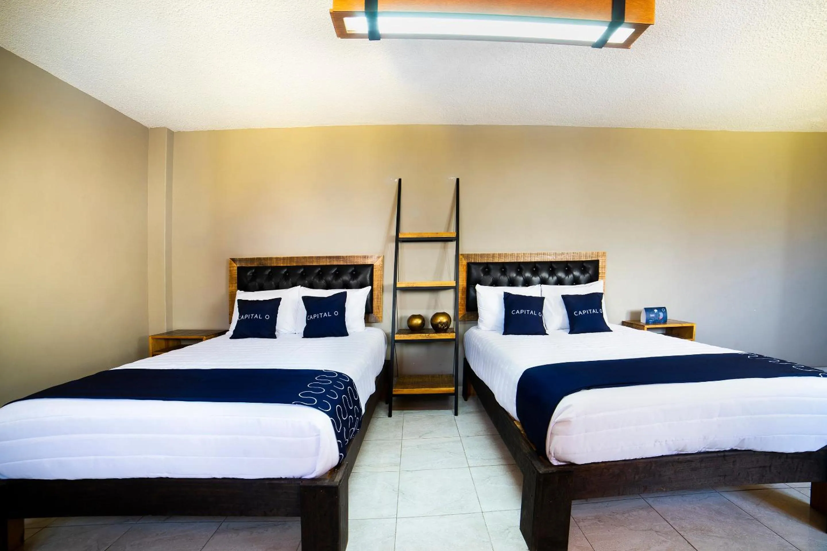 Bedroom, Bed in Capital O Hotel Diez