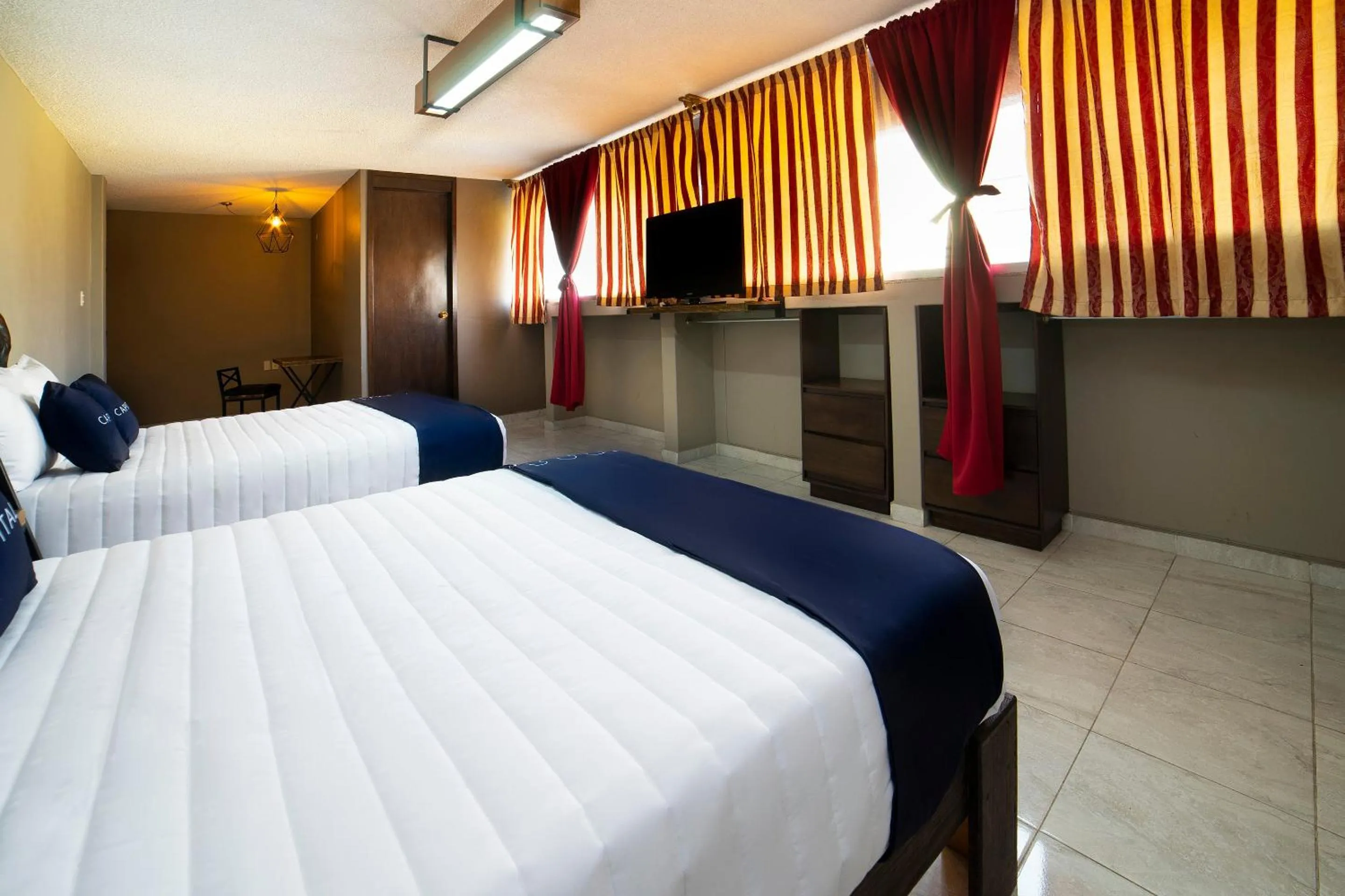 Bedroom, Bed in Capital O Hotel Diez