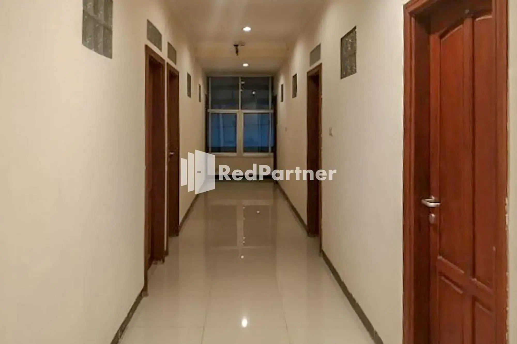 Property building in Palu City Guest House Mitra RedDoorz Property building in Palu City Guest House Mitra RedDoorz