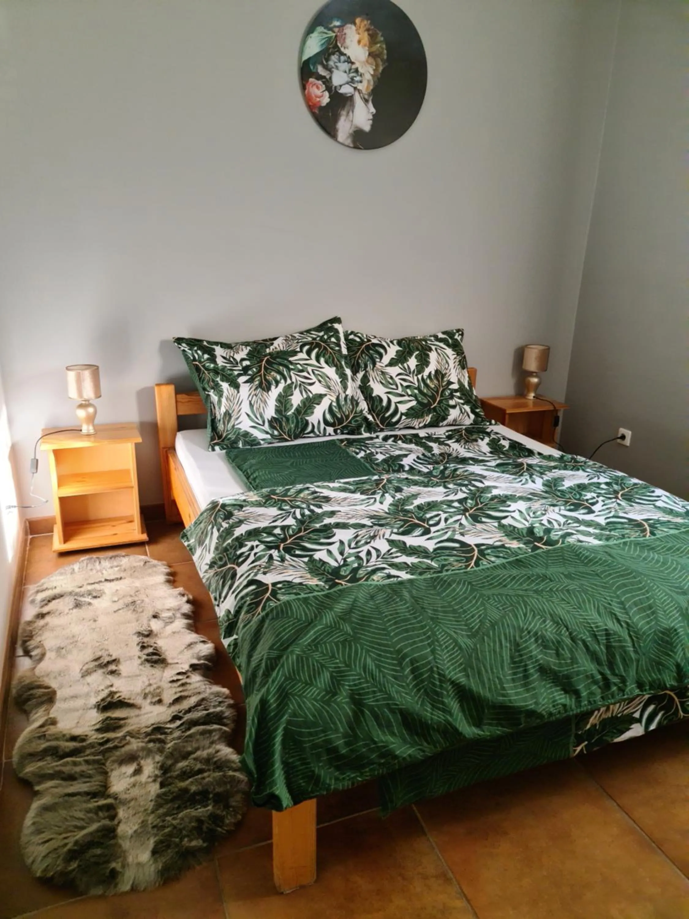 Bed in Amina Apartman