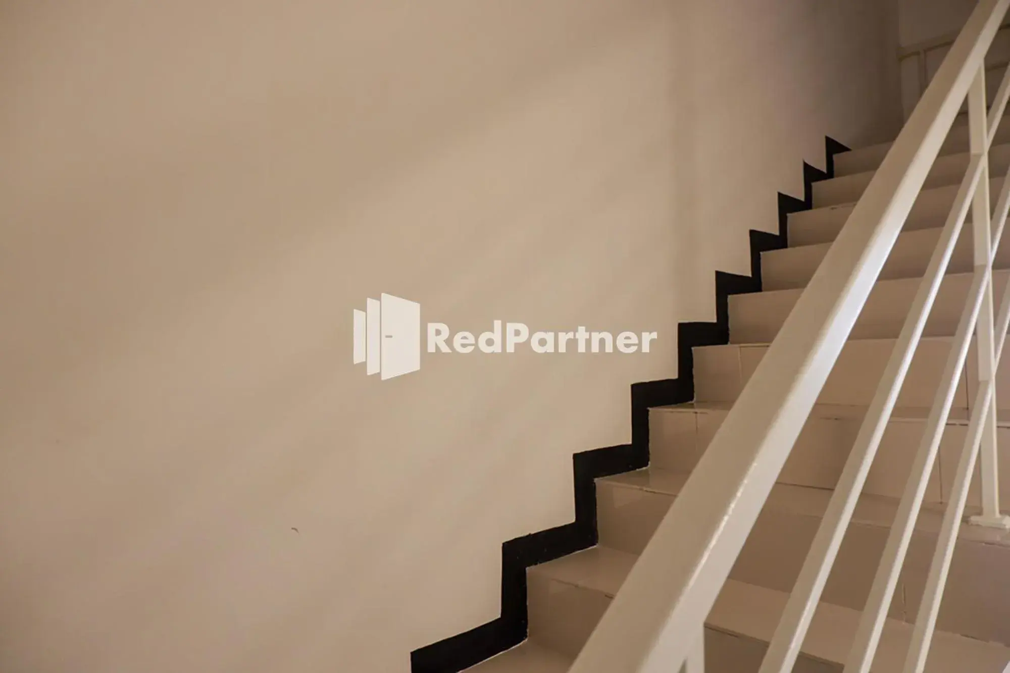 Property building in Rit's Garden At CitraGrand Semarang Mitra RedDoorz Property building in Rit's Garden At CitraGrand Semarang Mitra RedDoorz