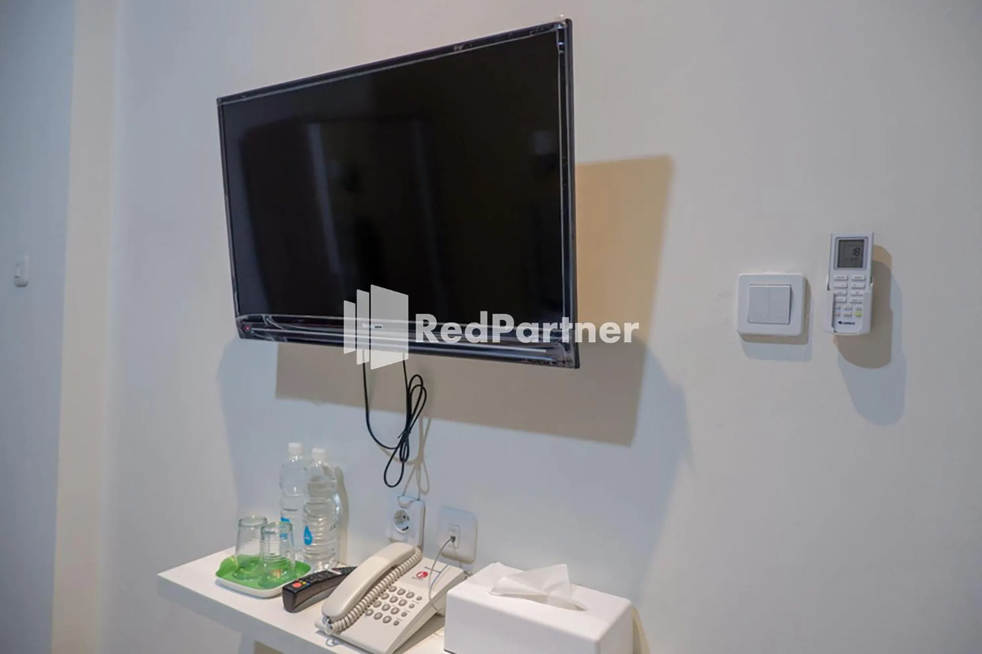 TV and multimedia in Rit's Garden At CitraGrand Semarang Mitra RedDoorz