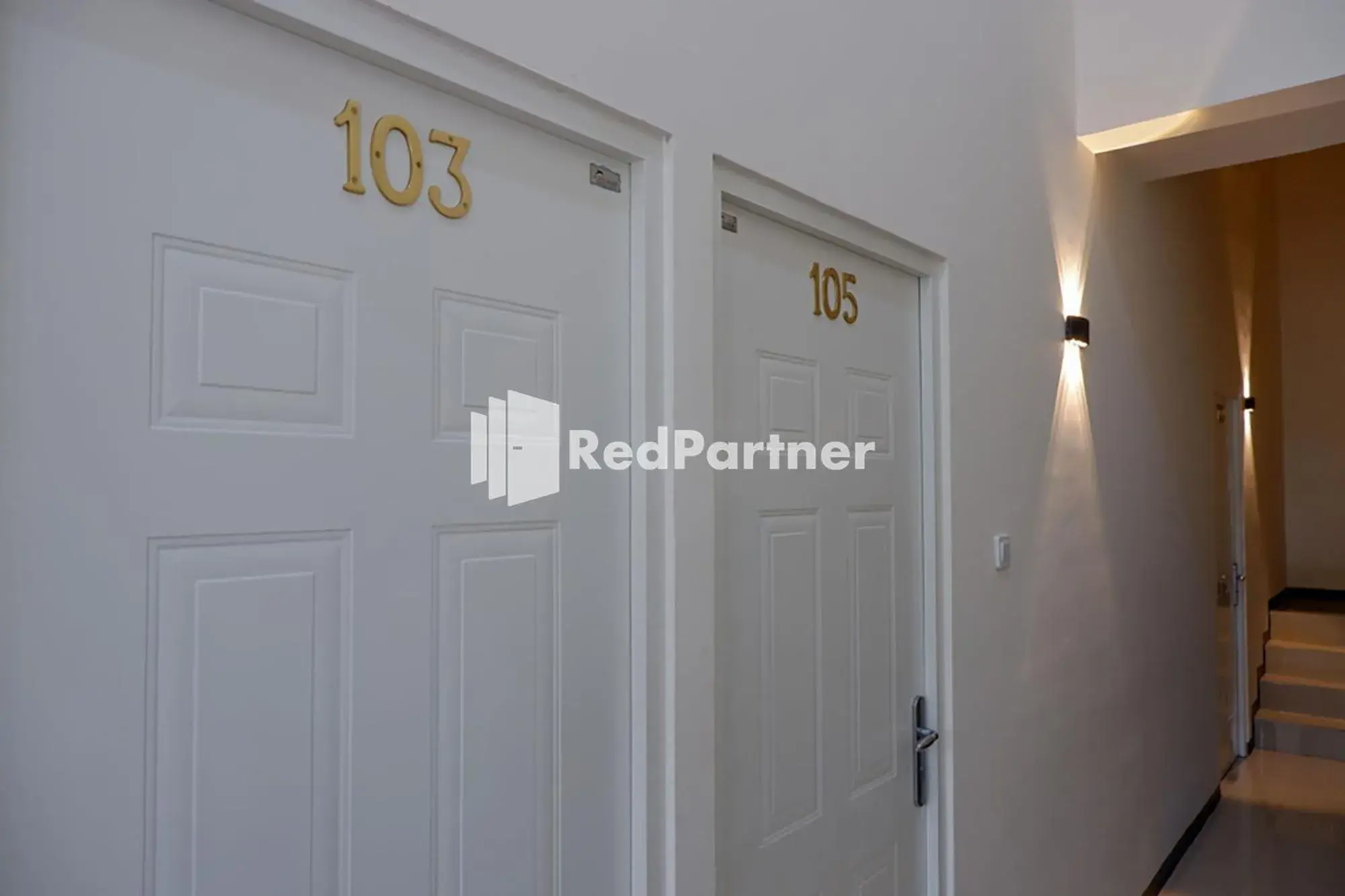 Facade/entrance in Rit's Garden At CitraGrand Semarang Mitra RedDoorz Facade/entrance in Rit's Garden At CitraGrand Semarang Mitra RedDoorz