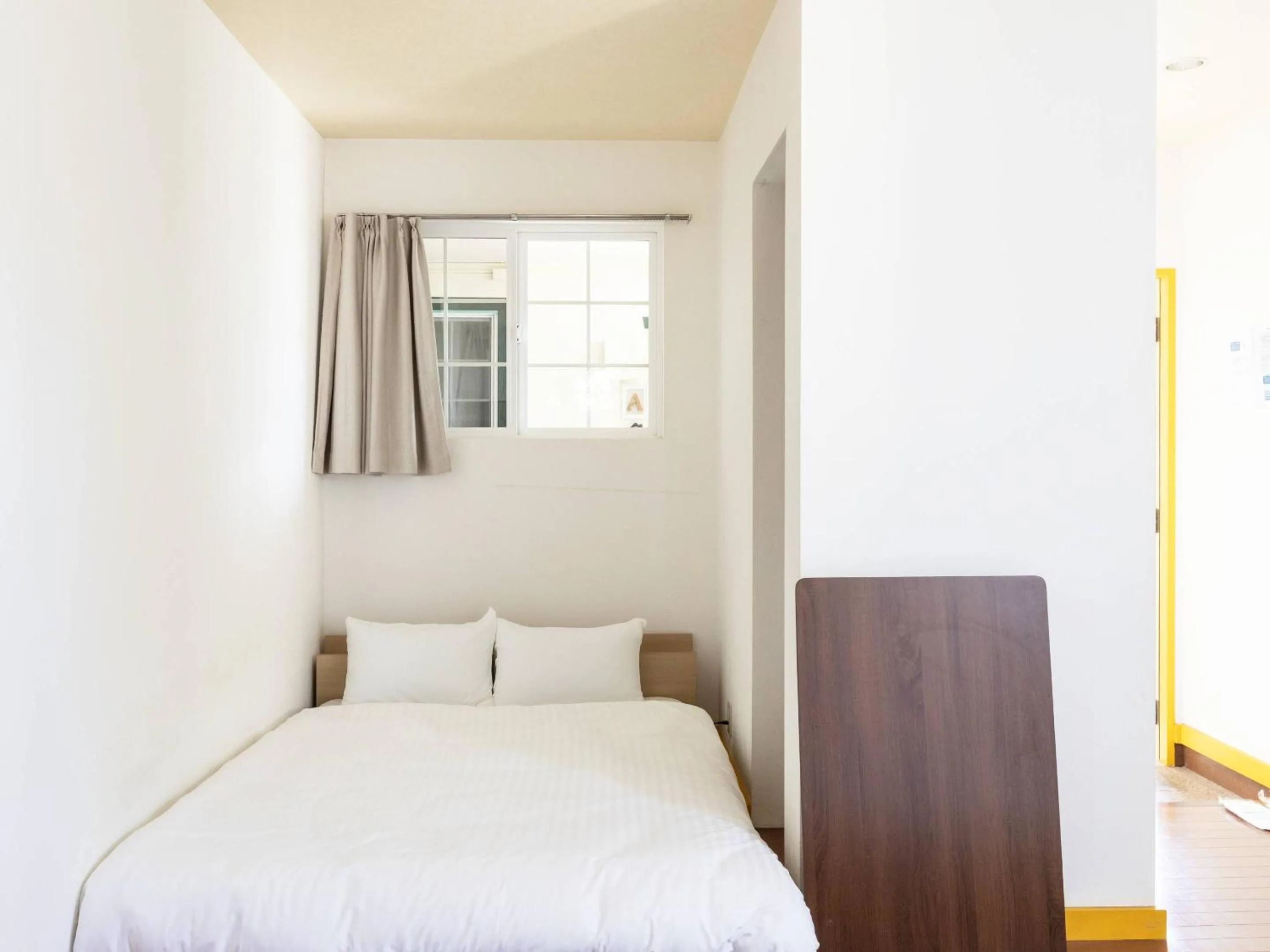 Bed in Bluebird Hotel